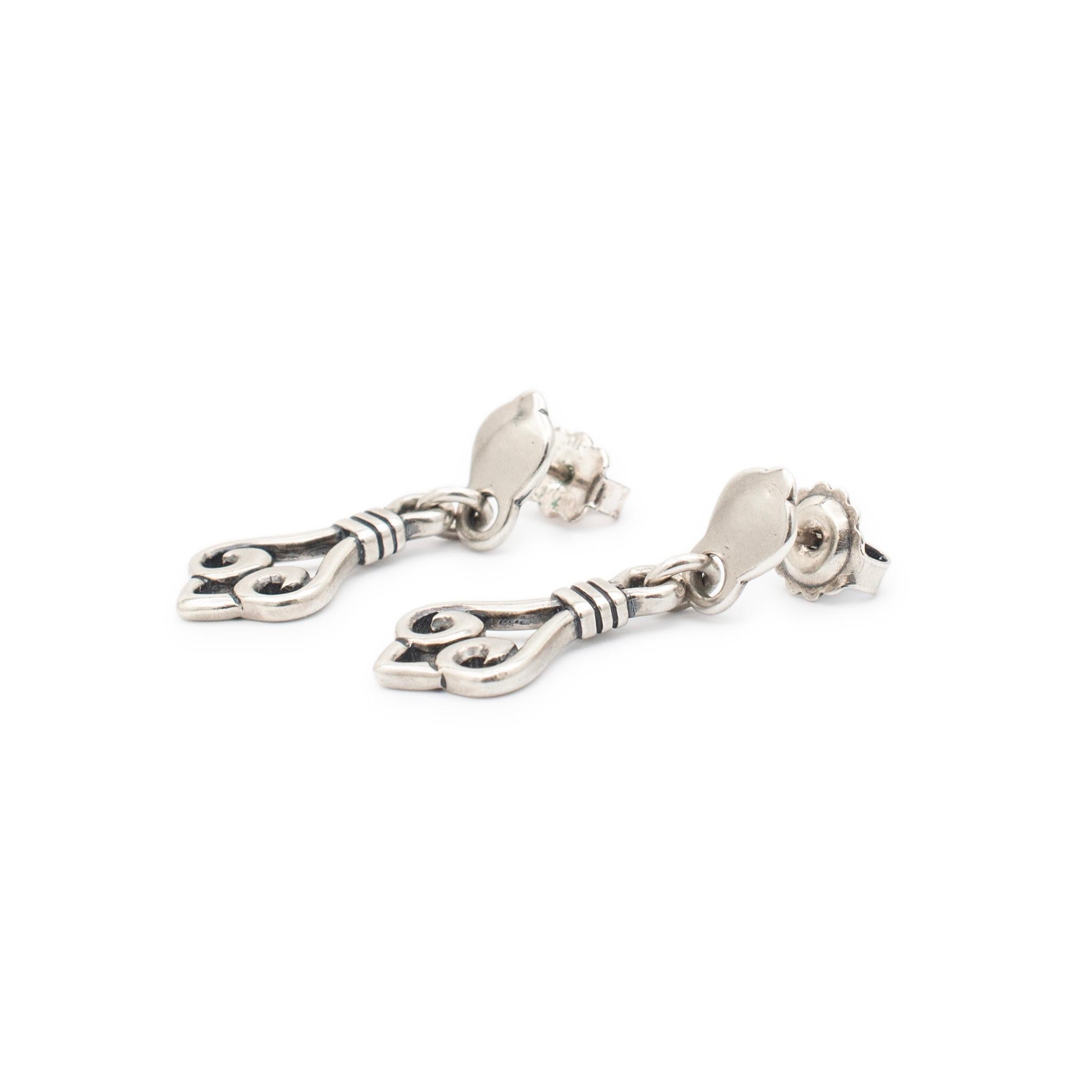 Gender: Ladies

Metal Type: 14K White Gold

Length: 30.00 mm

Width: 10.80 mm

Weight: 3.90 grams

Ladies silver dangle earrings with butterfly backs. The 