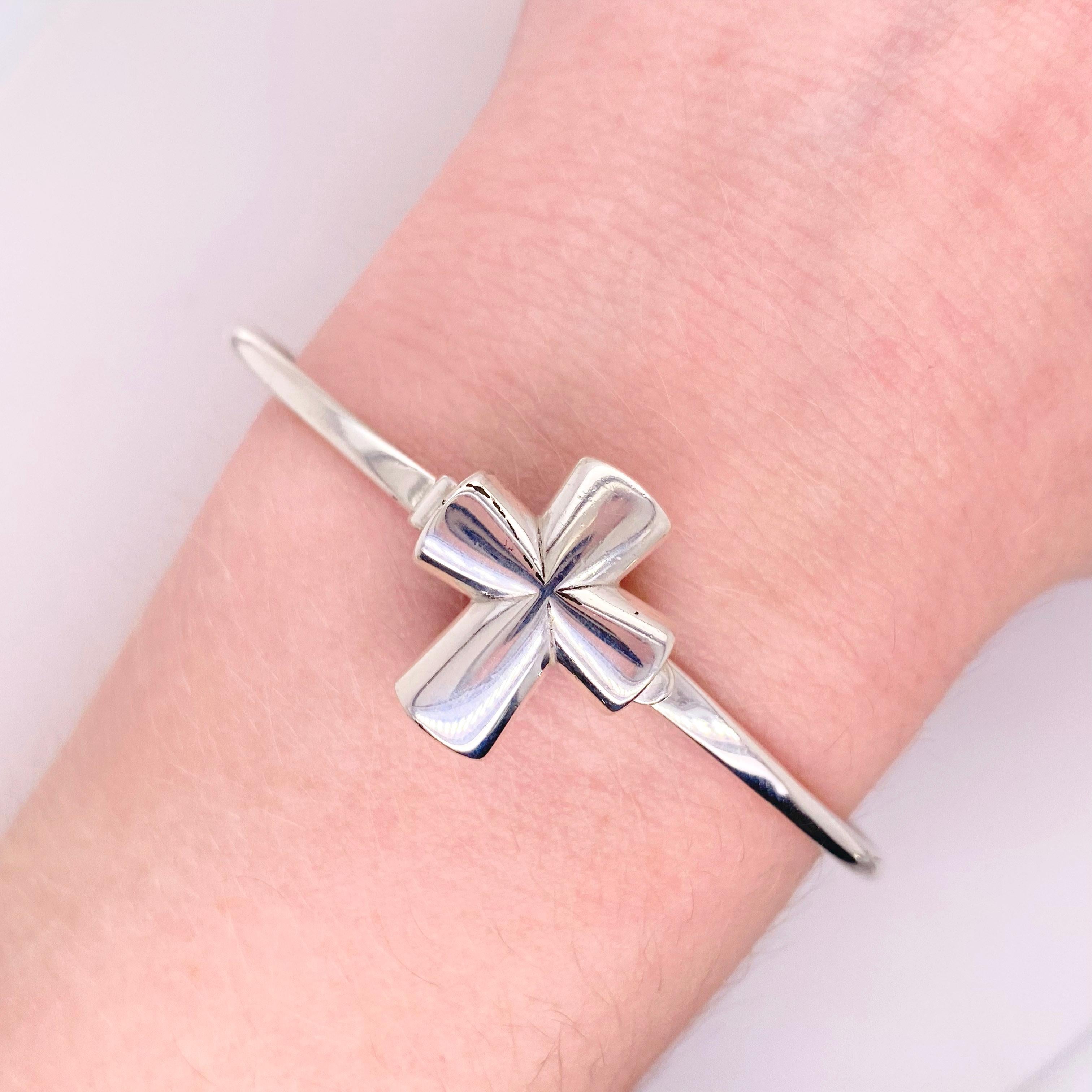 James Avery makes some of the best sterling silver in America. This cross represents faith in God and the Bible. The bangle bracelet can be worn every day and is very omfortable to wear! The details for this gorgeous bracelet are listed