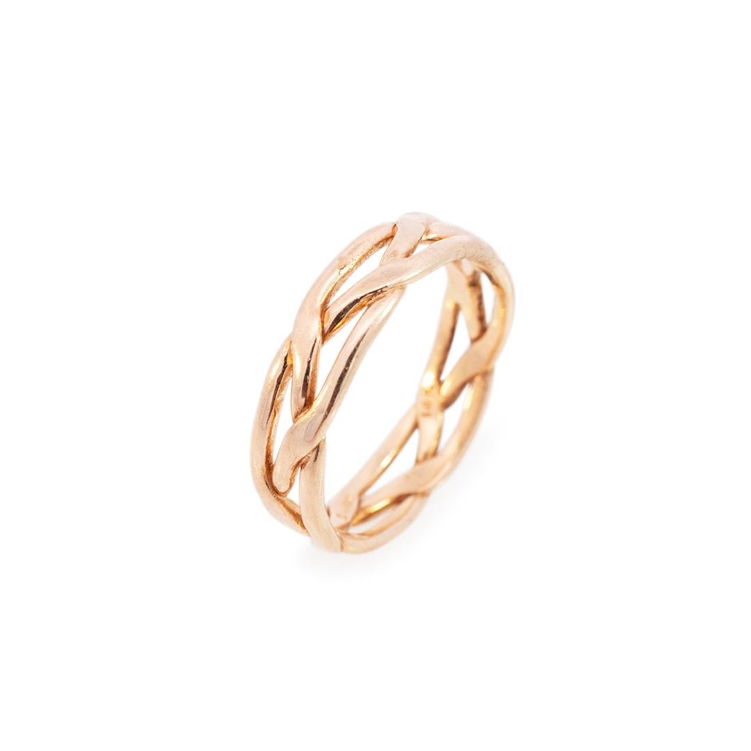 Man's designer made polished 14K yellow gold, wedding band with a soft-square shank. The band is a size 9.5 and is 5.40mm thick. The band weighs a total of 4.20 grams. Engraved with 