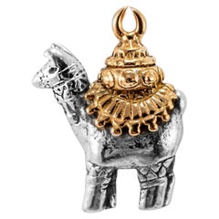 Colgante de llama de bronce y plata de ley 925 retirado de James Avery