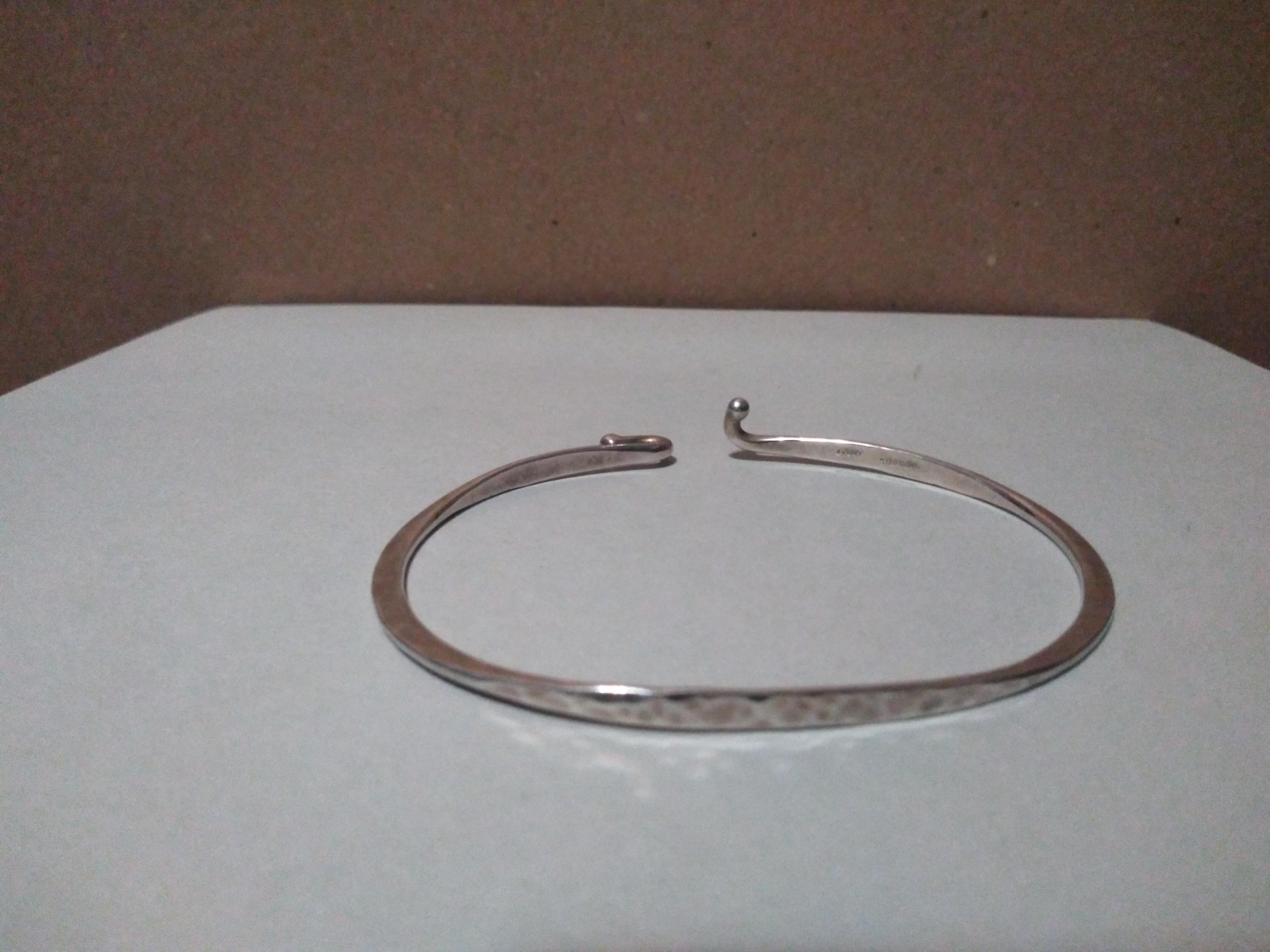 This is a beautiful James Avery creation. It's made of Sterling Silver and will make a gorgeous addition to your jewelry collection.