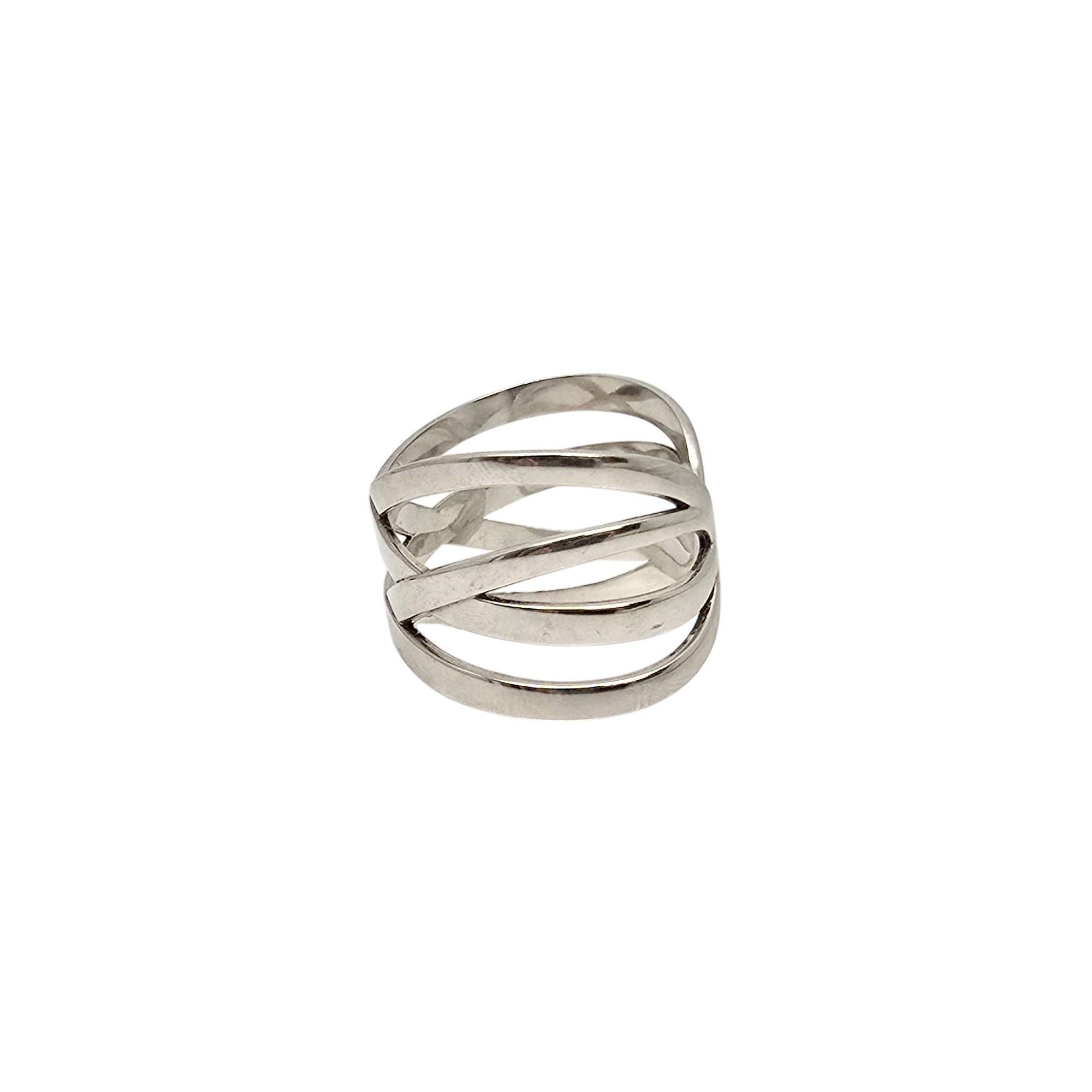 Bracciale infinito a doppia X incrociata in argento 925 di James Avery.

Questo bracciale autentico di James Avery presenta un intricato disegno intrecciato.

Misura circa 6 3/4