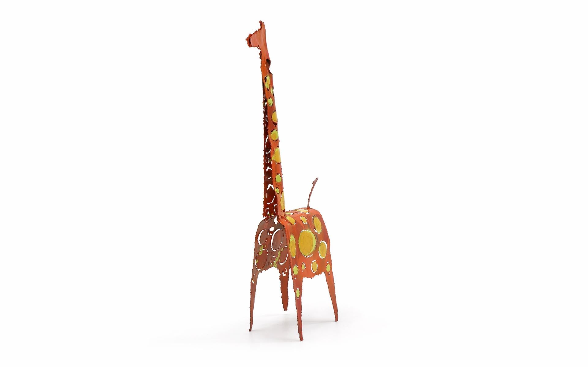 Tabletop girafe sculpture by James Bearden. Enameled torch cut steel in orange and yellow.