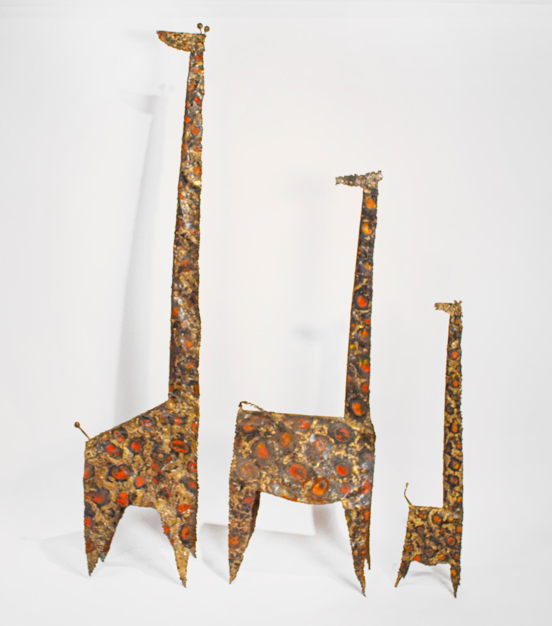 Amazing family of three large scale Giraffe sculptures by renowned Iowa abstract artist James Anthony Bearden. From his Animal Series, The large Giraffe measures 72