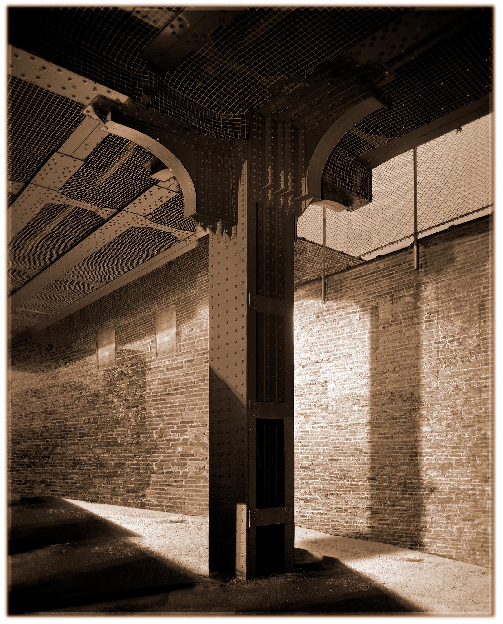 James Bleecker Black and White Photograph – High Line: Säule (Sepia Toned Architectural Photograph in Manhattan)