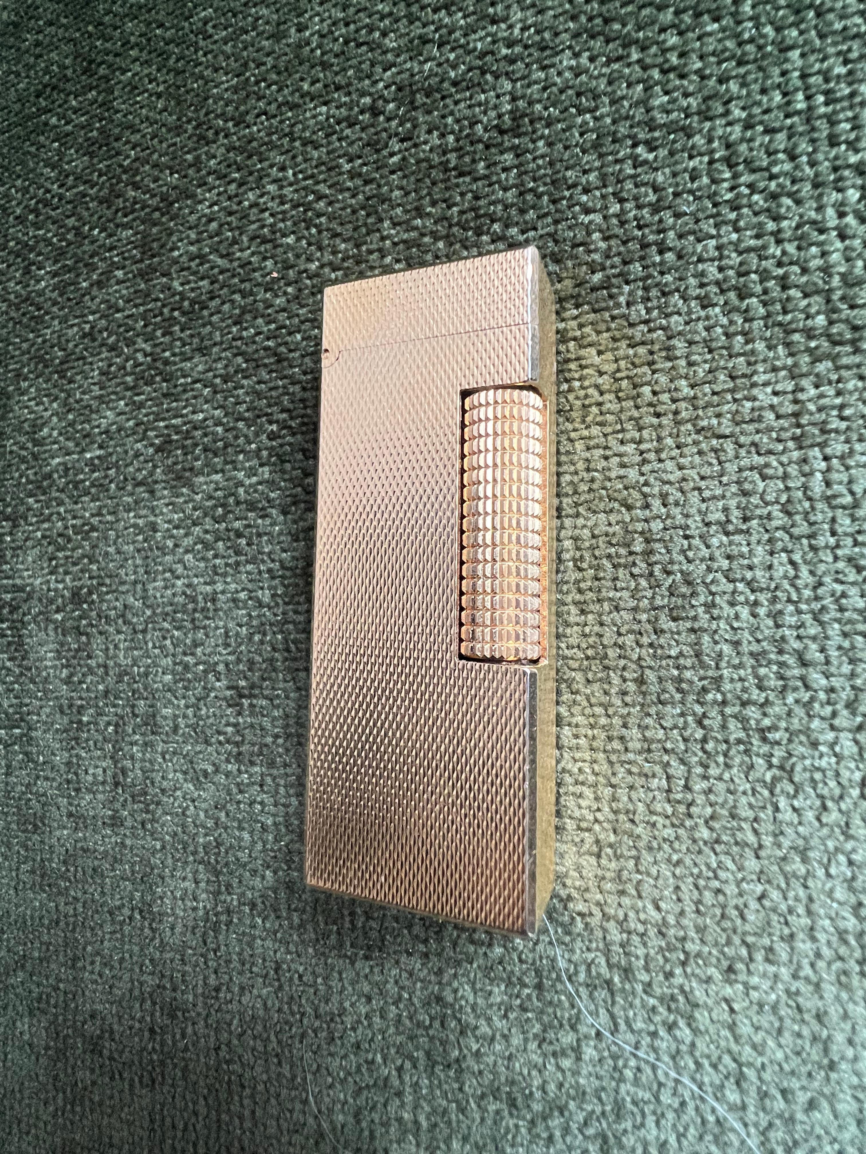 The James Bond Iconic and Rare Vintage Dunhill Gold and Swiss Made Lighter 3