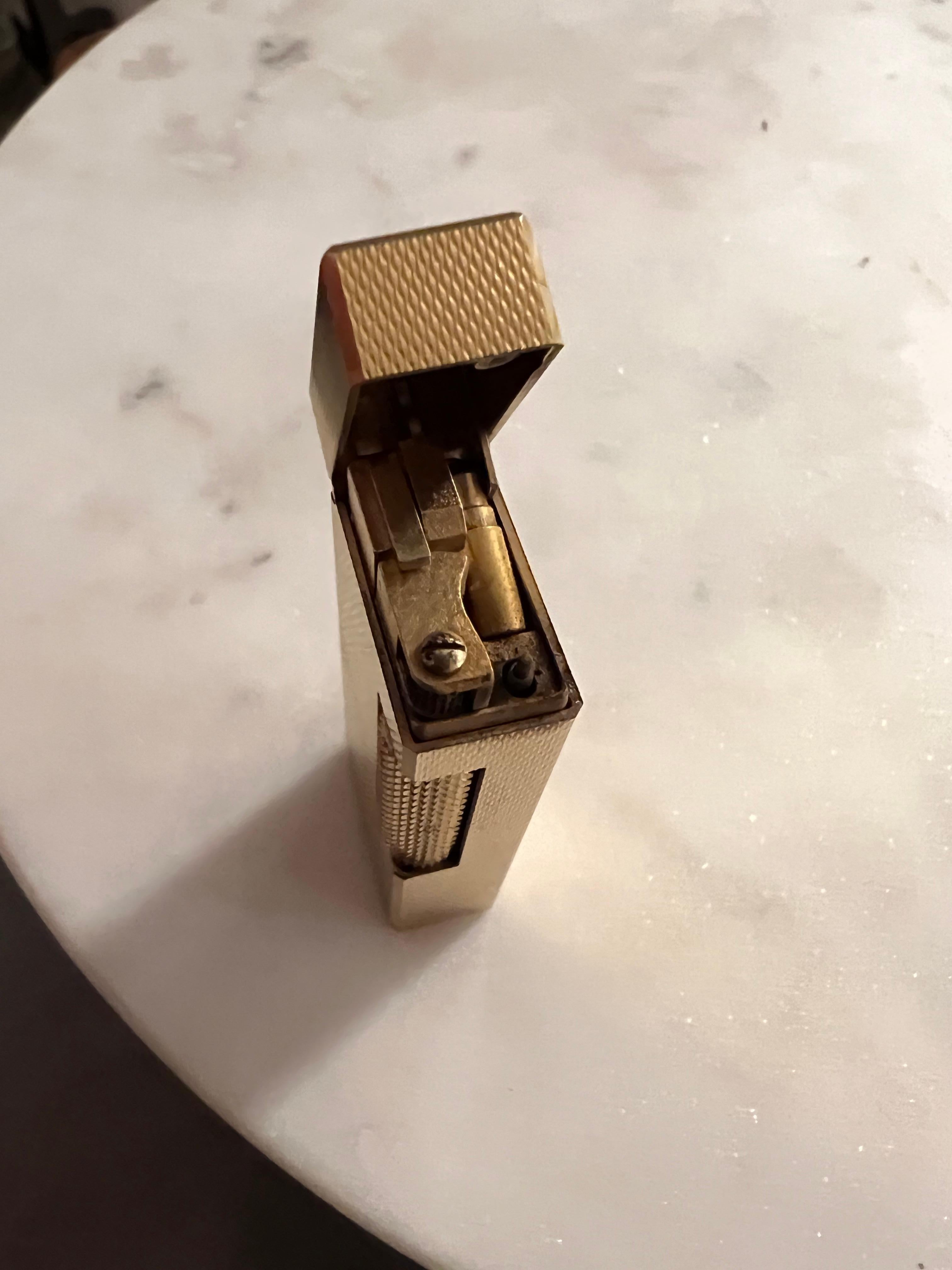 The James Bond Iconic and Rare Vintage Dunhill Gold and Swiss Made Lighter 4