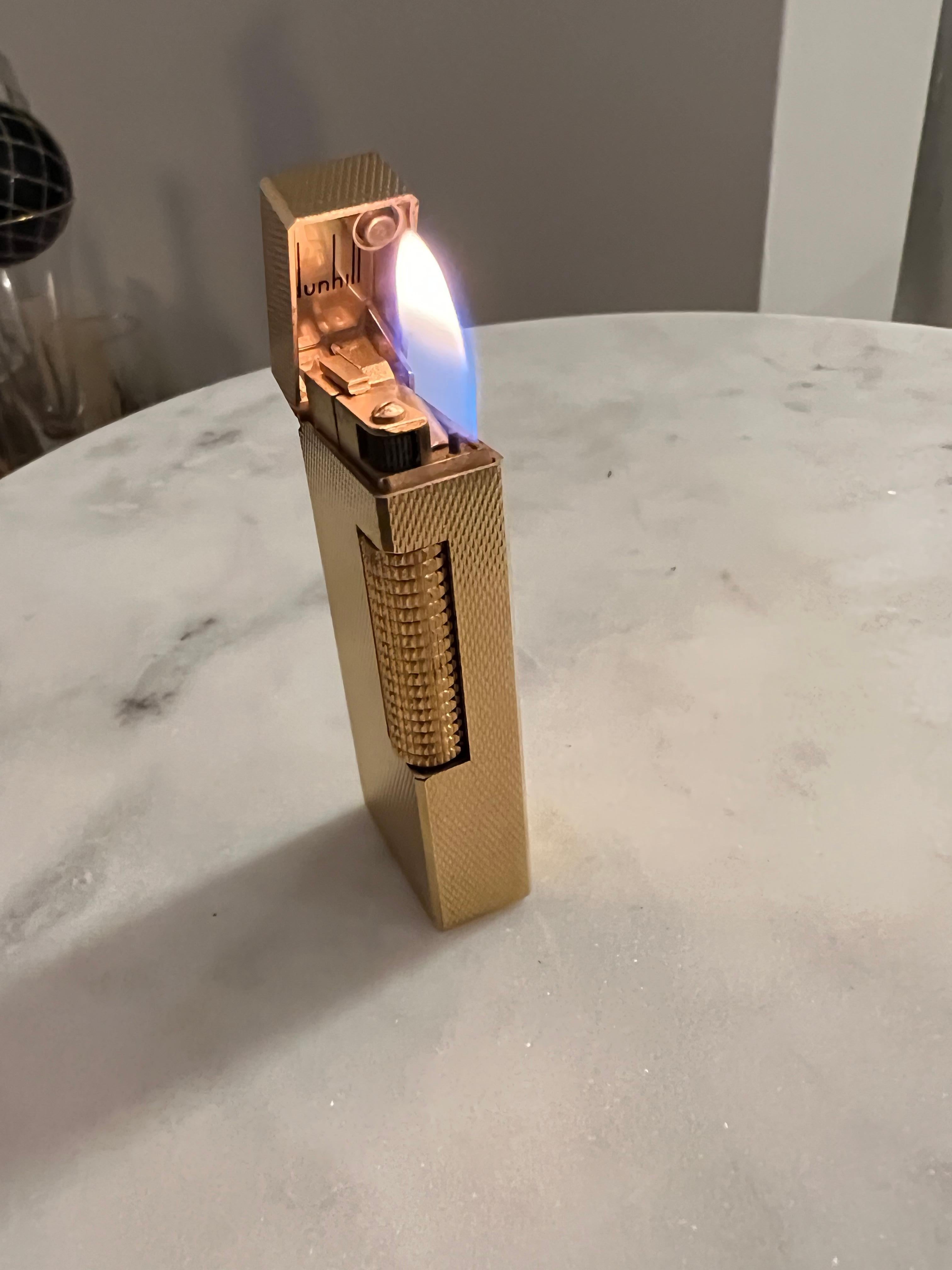 The James Bond Iconic and Rare Vintage Dunhill Gold and Swiss Made Lighter 9