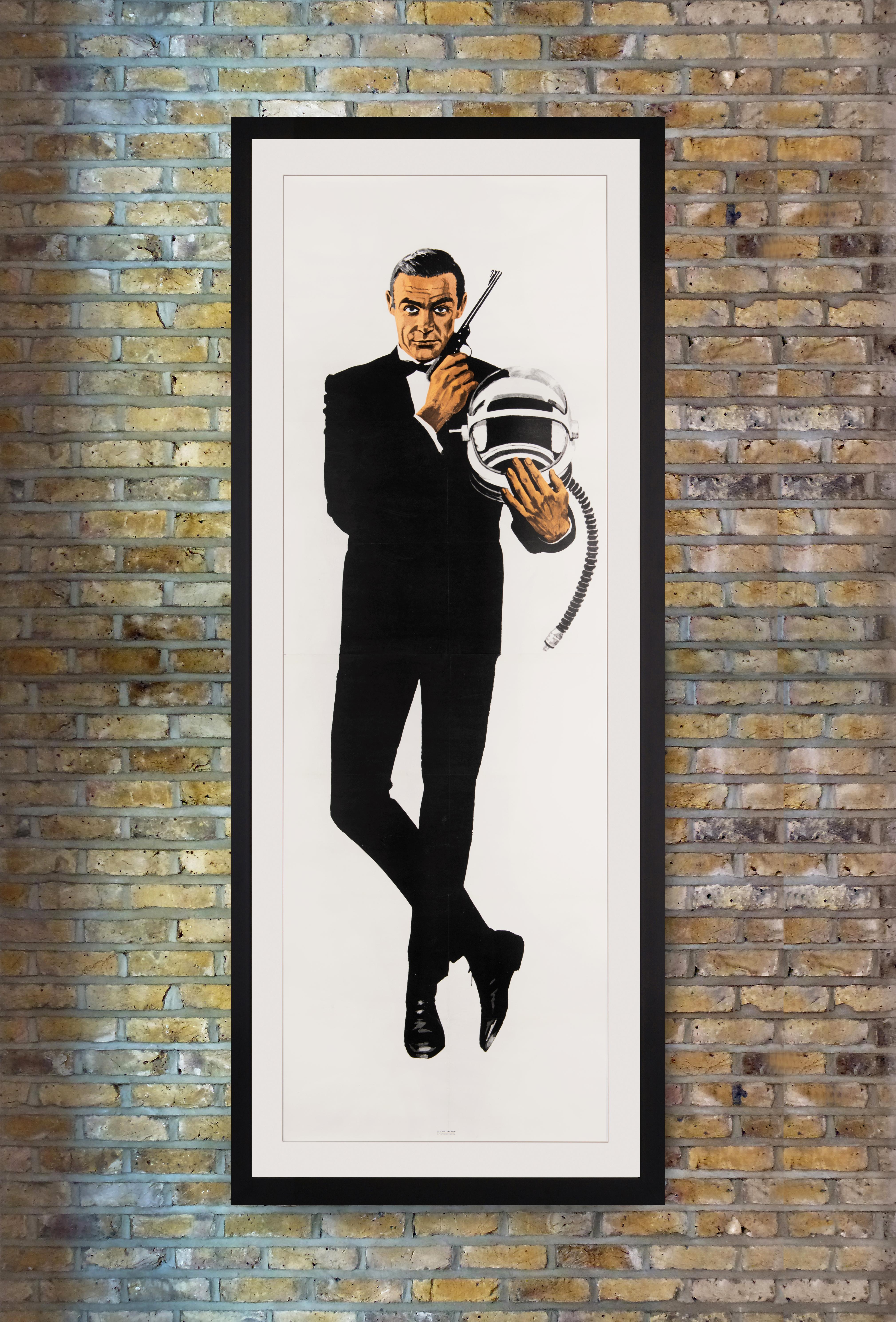 An exceptionally rare advance French door panel or 'pantalon' poster issued for the original release of 'You Only Live Twice' in France, featuring a full-size portrait of Sean Connery as James Bond in classic 007 pose, suavely suited with his