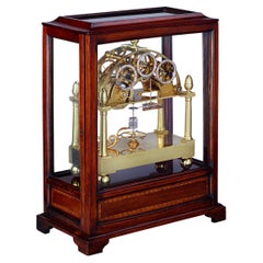 Horloge régulateur de table squelette James Condliff