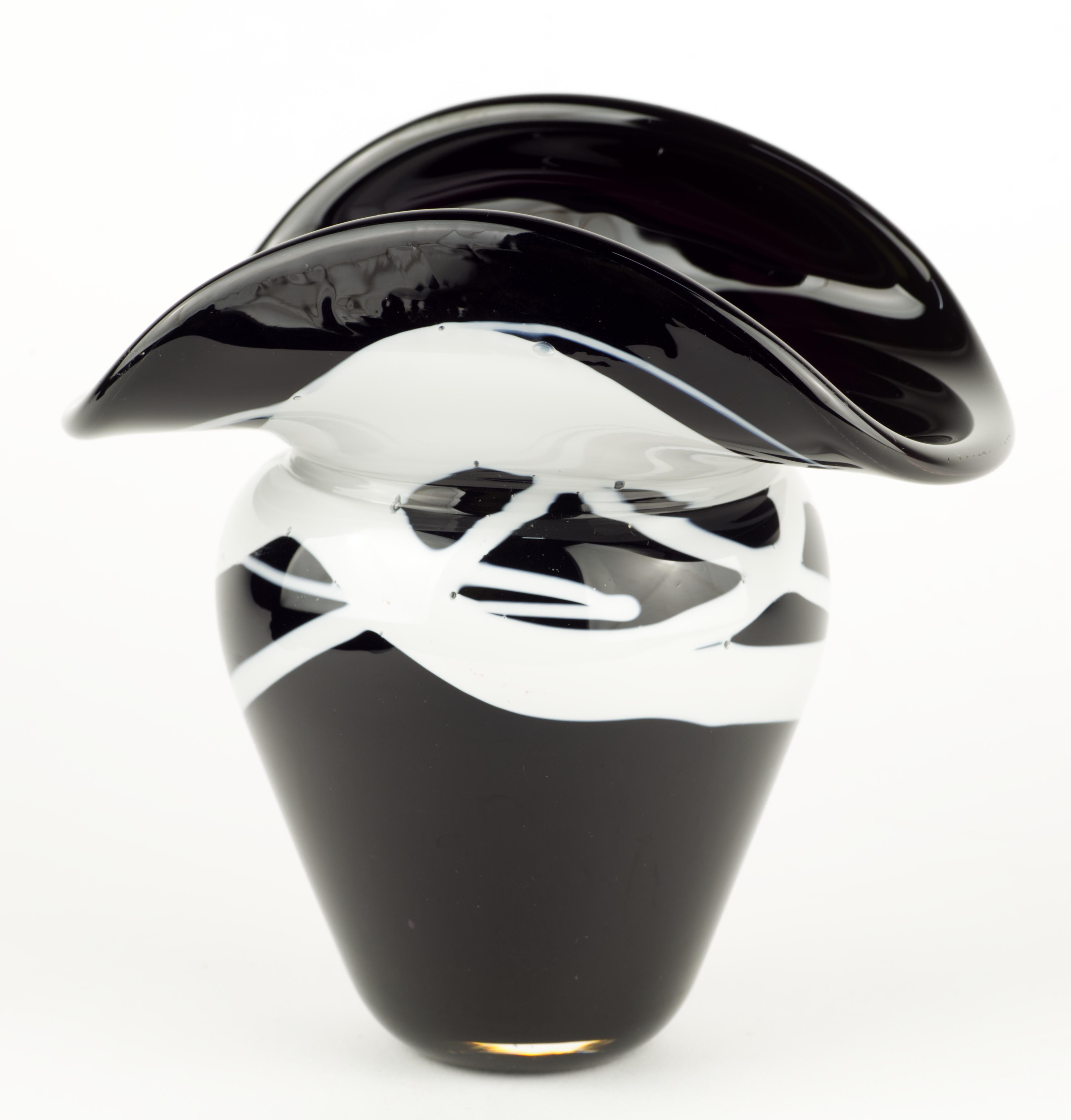  Sculptural Organic Modern vase has graphic shape with abstract geometrical pattern of fused white glass flowing along the curves of the vase. Black and white glass core is enclosed in clear glass in sommerso technique, adding depth and definition