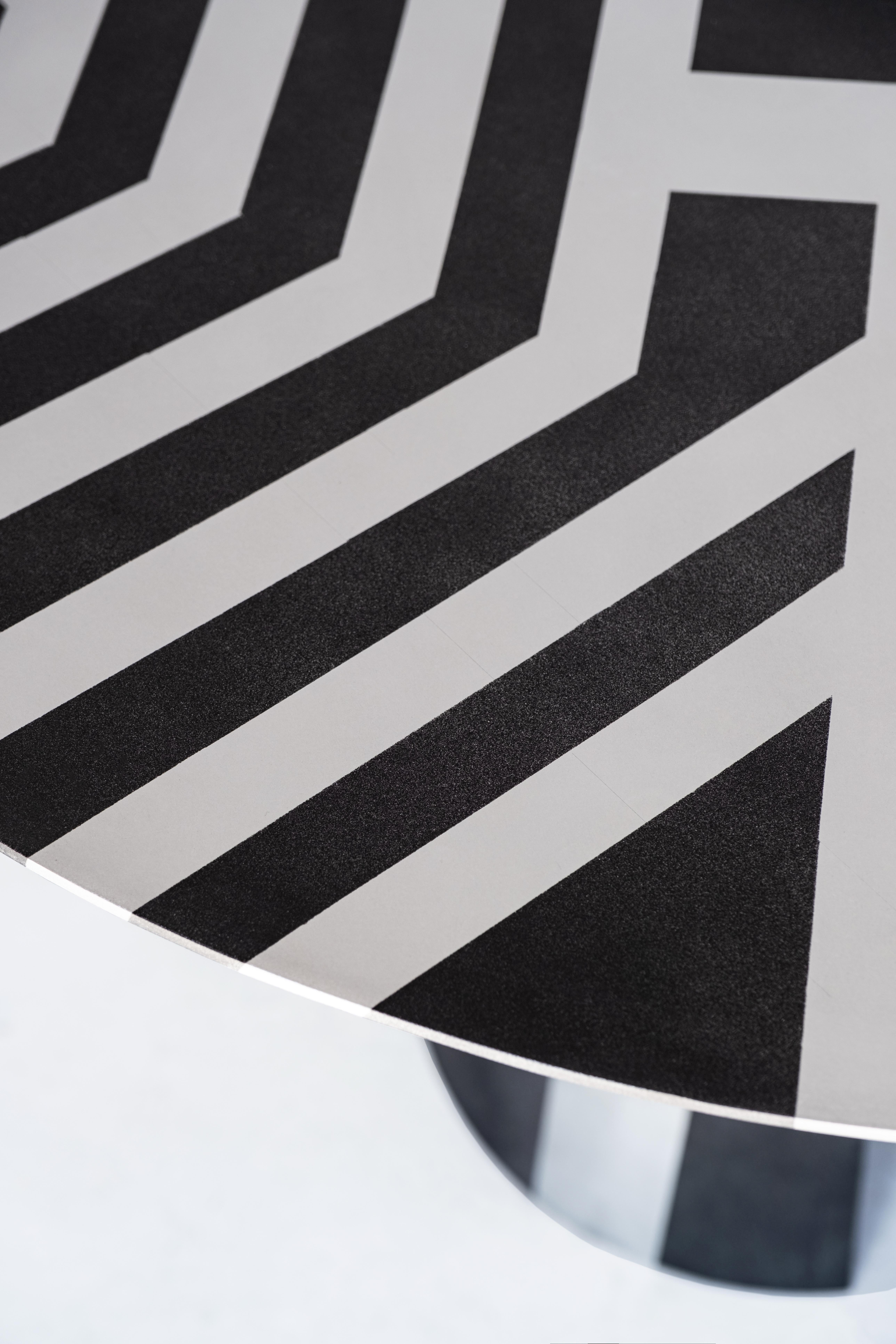 Prototype made of burnished aluminum plate. 
The first in a series inspired by the Dazzle ships of WWI.
Comes with Certificate of Authenticity signed by James de Wulf. 
Limited 1 of 1. This table will not be produced again.

Table is 47