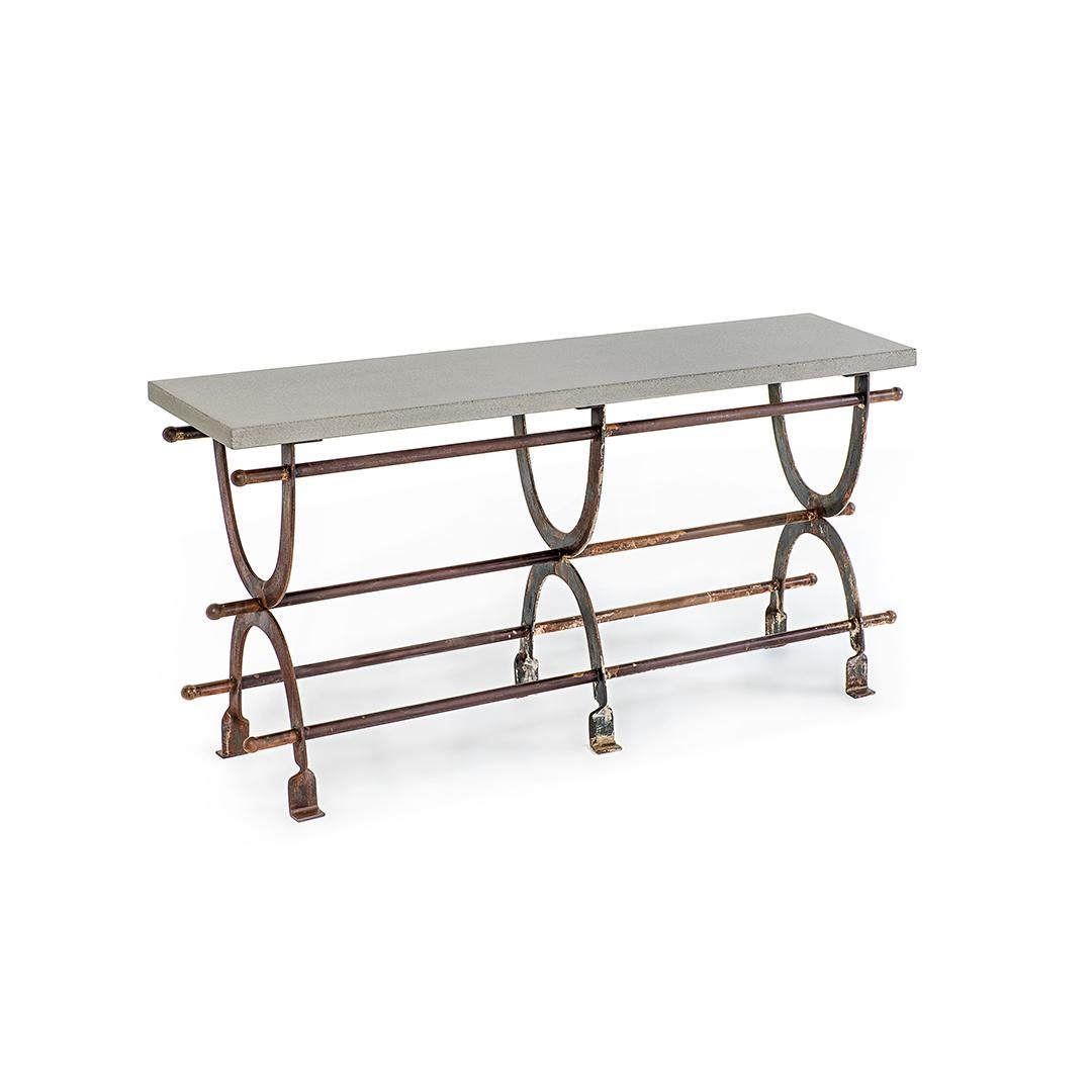 A mix of Brutalist form and Bauhaus design, the Campaign console table sets the tone in any space. The console top is constructed of reinforced, cast concrete, finished with a proprietary wax to give it a slick touch and unique sheen. The console