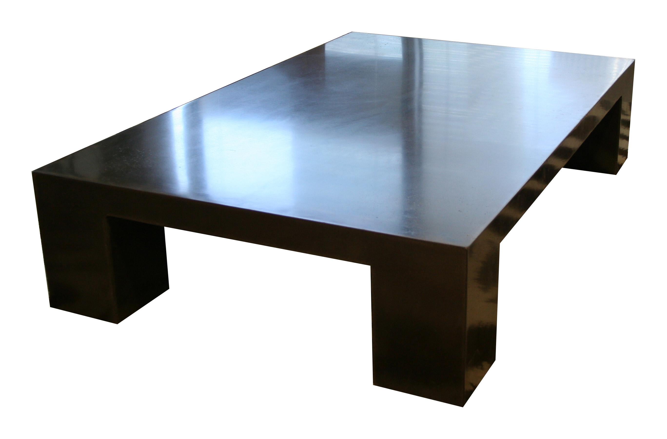 Cast carbon fiber-reinforced concrete Block Coffee Table. 
Suitable for indoor and outdoor use. 
Table will develop a gradual patina over time adding to the uniqueness of the material's character. 

Available Colors:
Natural Tone
Light Grey
Dark