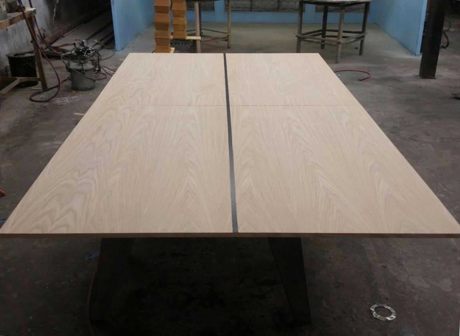 A white oak ping pong and dining table top for effortless conversion of the James de Wulf Billiards Table. The handsome white oak is chosen in this application for its strength, weight, and durability. The oak wood is hard and dense with a very