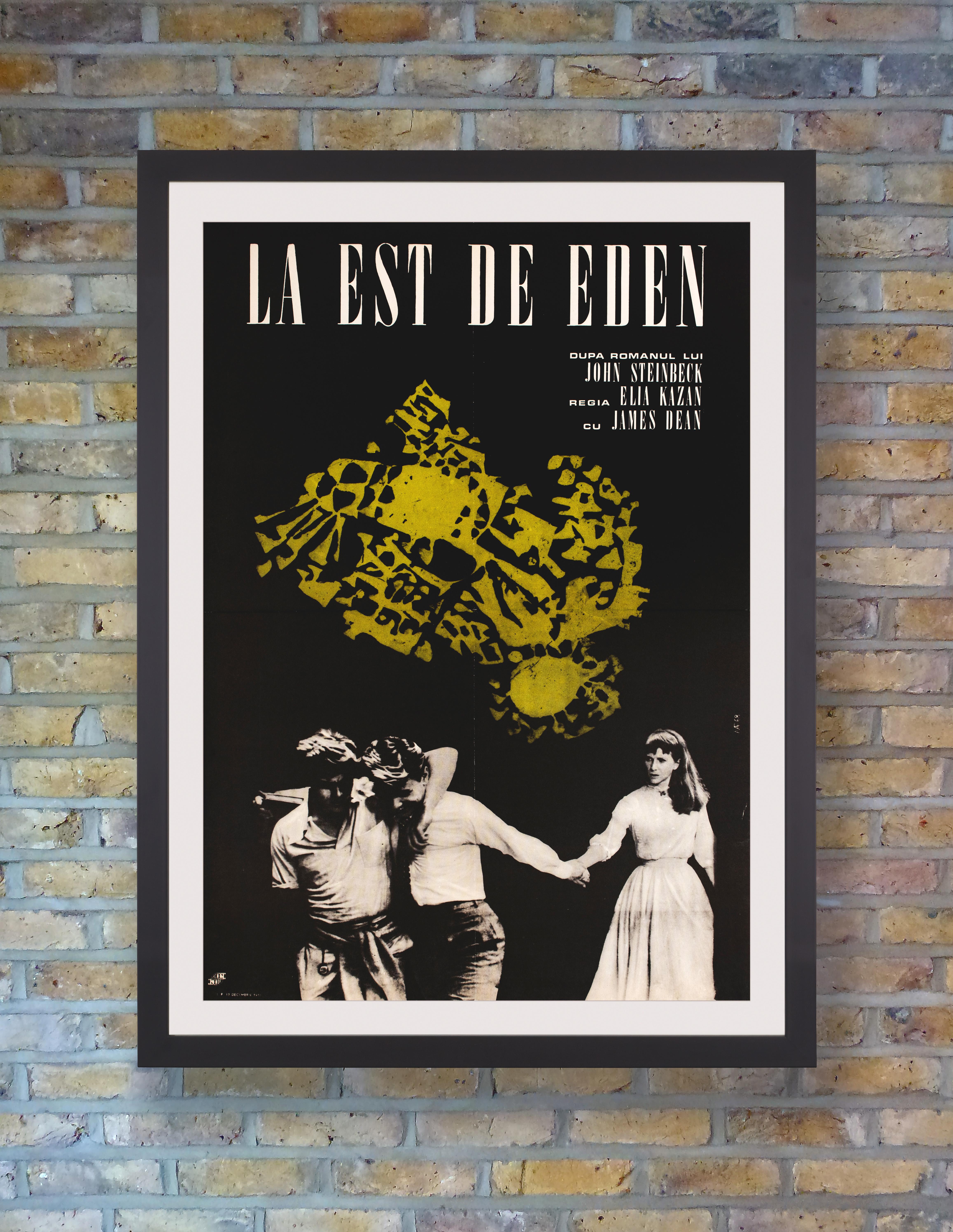 A dark and moody photomontage teases the love triangle at the centre of the drama on this rare poster for the first Romanian release of Elia Kazan's 1955 adaptation of John Steinbeck's 'East of Eden,' which was itself a loose adaptation of the