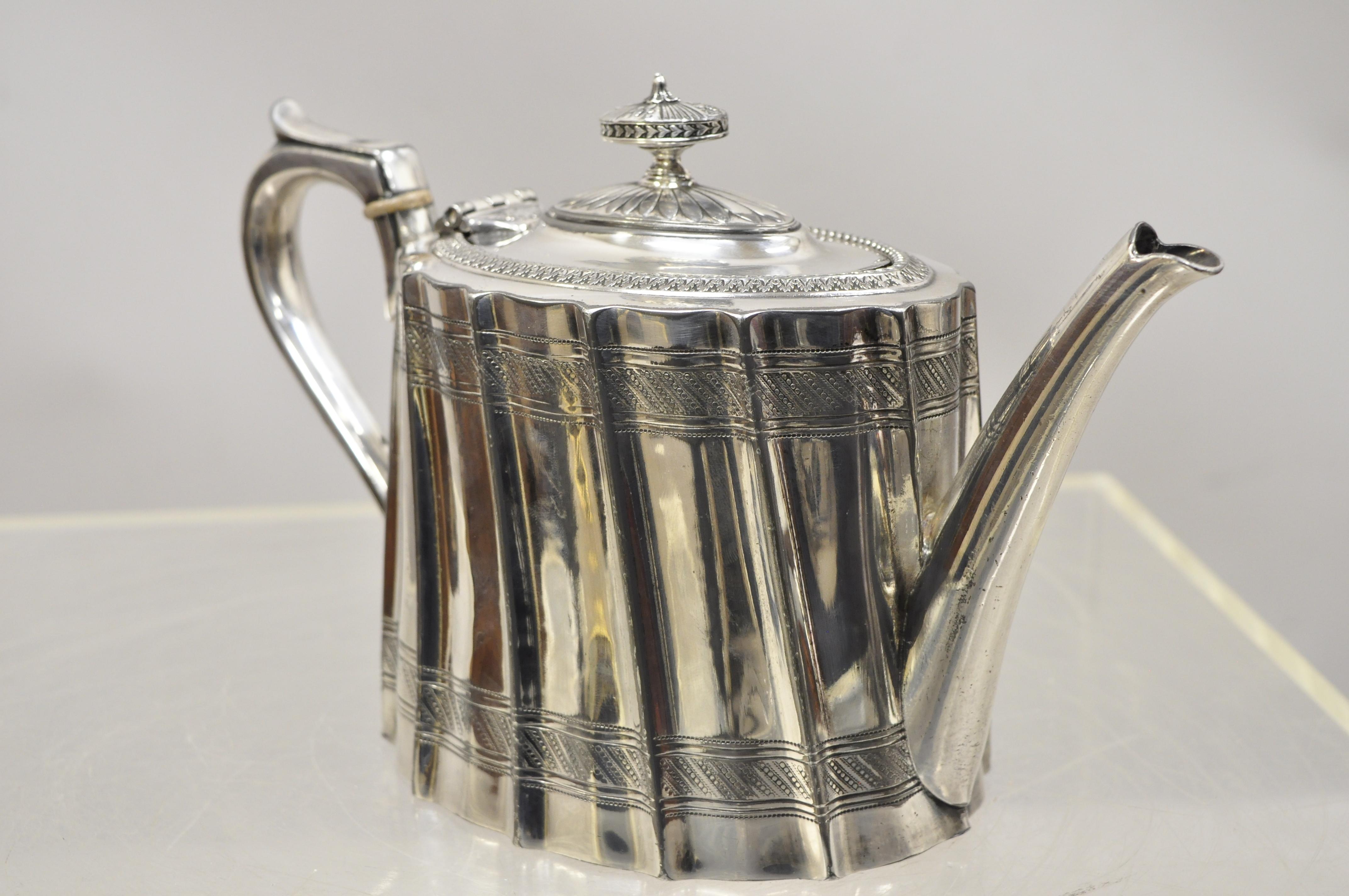 James Dixon & Sons English Edwardian Victorian silver plated coffee pot teapot (B). Item features urn form handle, chased form, marked to underside, very nice antique item, quality English craftsmanship, circa late 19th century. Measurements: 6