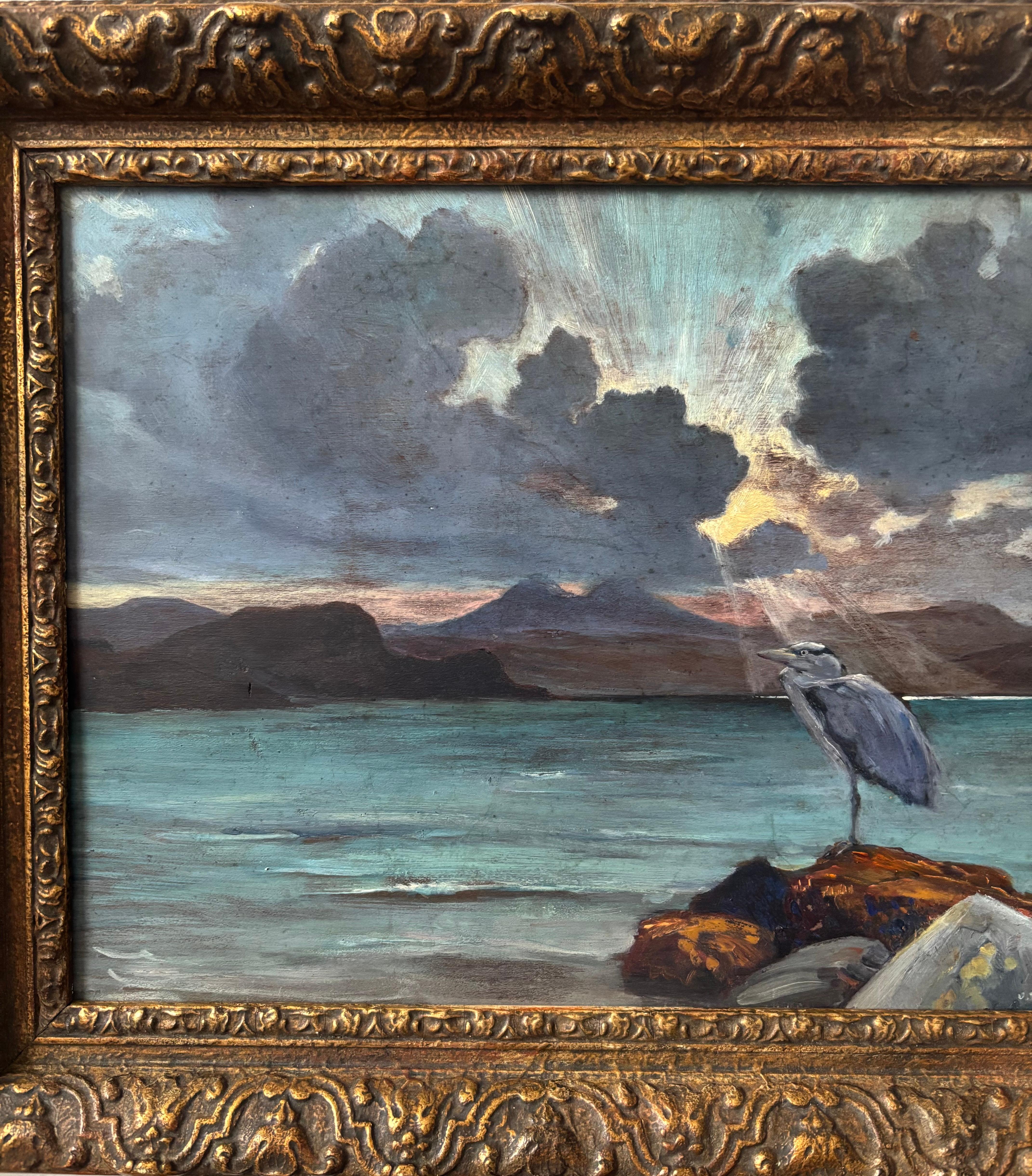 Eine sehr stimmungsvolle Szene mit einem majestätischen Reiher, der vor einem Sonnenuntergang in einer weitläufigen Gebirgslandschaft sitzt, wobei die Sonne dramatisch durch die Wolken bricht, wahrscheinlich bei Sonnenaufgang.

James F M Floyd