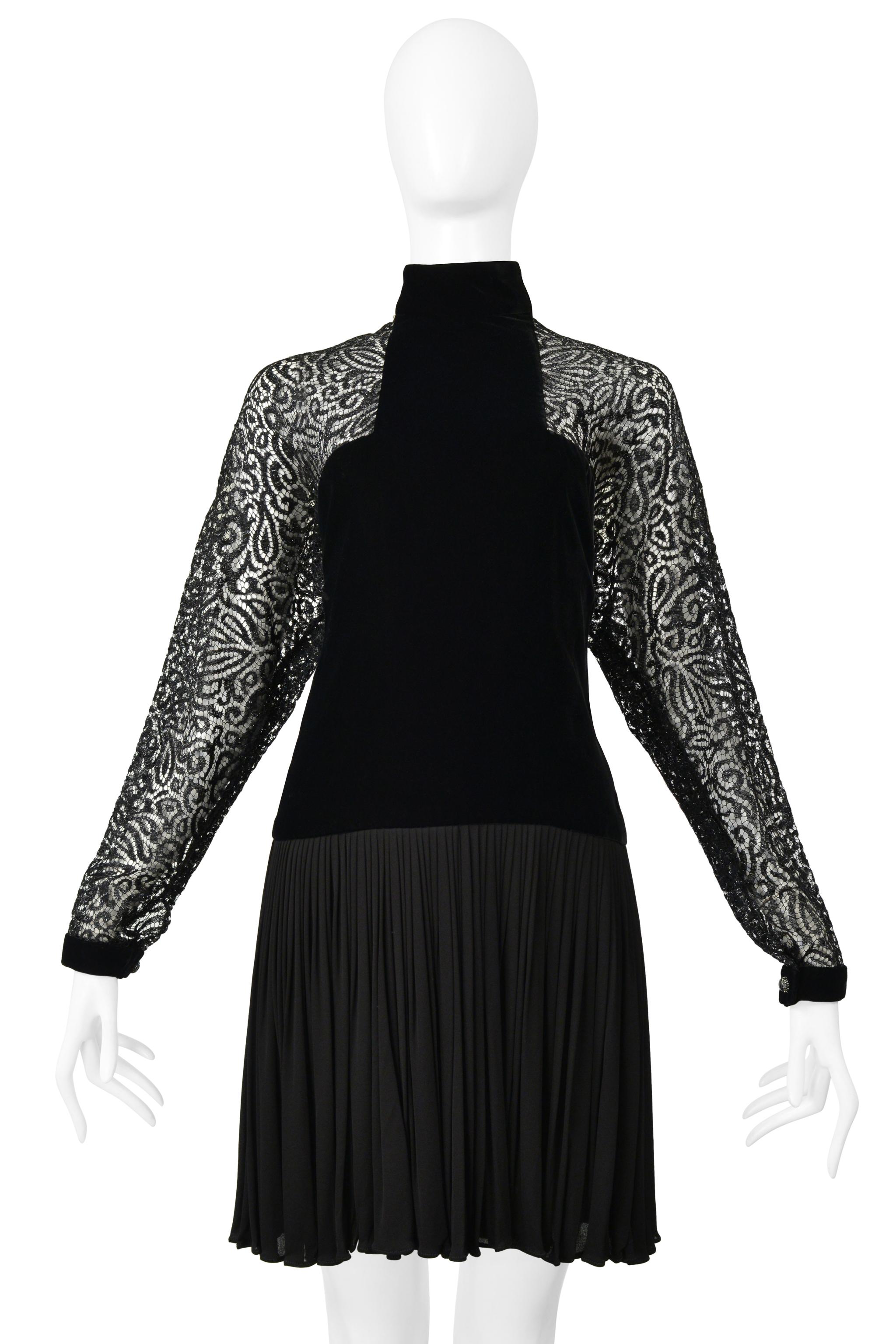 Resurrection is excited to present a vintage Galanos fancy black illusion lace cocktail dress featuring a velvet fitted bodice, lace cutouts, velvet cuffs with rhinestone buttons, a high collar, a gathered skirt, and a center back