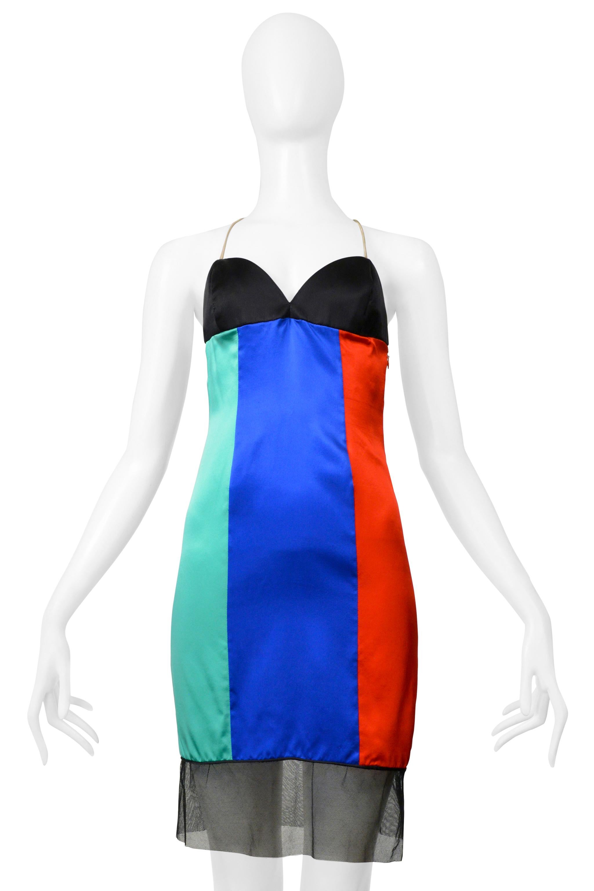 Resurrection is excited to present a vintage Galanos tri-color fancy cocktail dress featuring a fitted slip dress body, red, blue, and teal green satin panels, a black satin bra top, black mesh trim at the hem, nude straps, and a hidden side