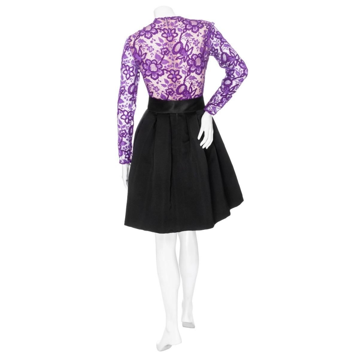 Galanos Vintage Purple and Black Lace Bow Dress 

Circa 1980s; for I. Magnin
Black satin; purple lace bodice
Long sleeve with snap fastening at cuffs
Round neckline
Side seam pockets
Optional self-tie bow sash; reversible to wear in front or