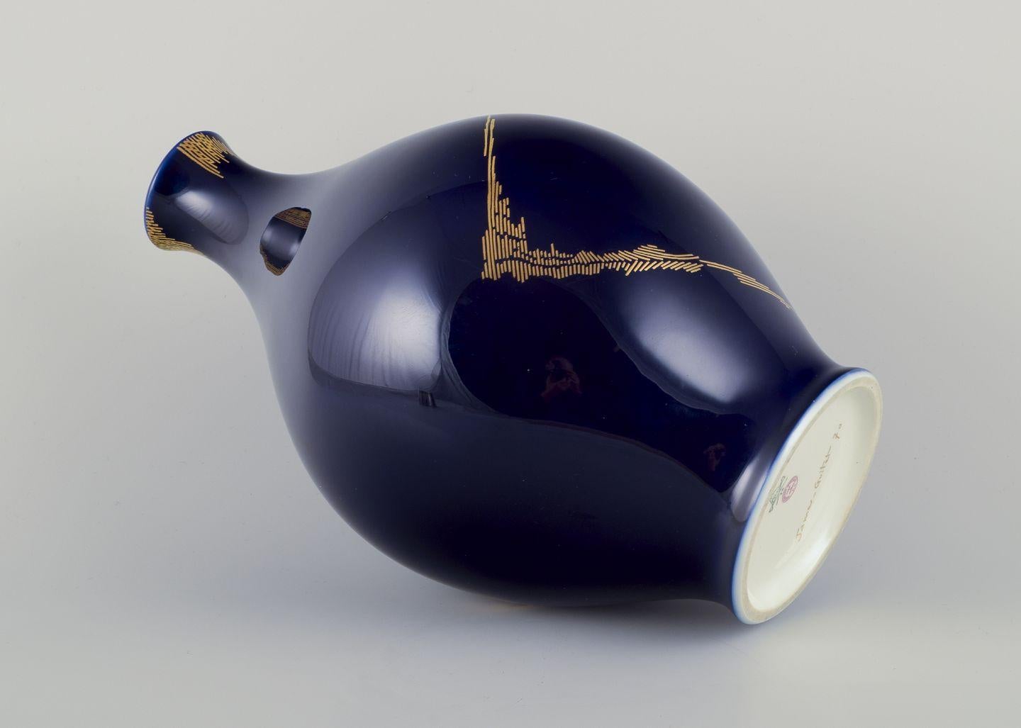 James Guitet for Sèvres. Large porcelain vase with Sèvres blue glaze. In Excellent Condition For Sale In Copenhagen, DK