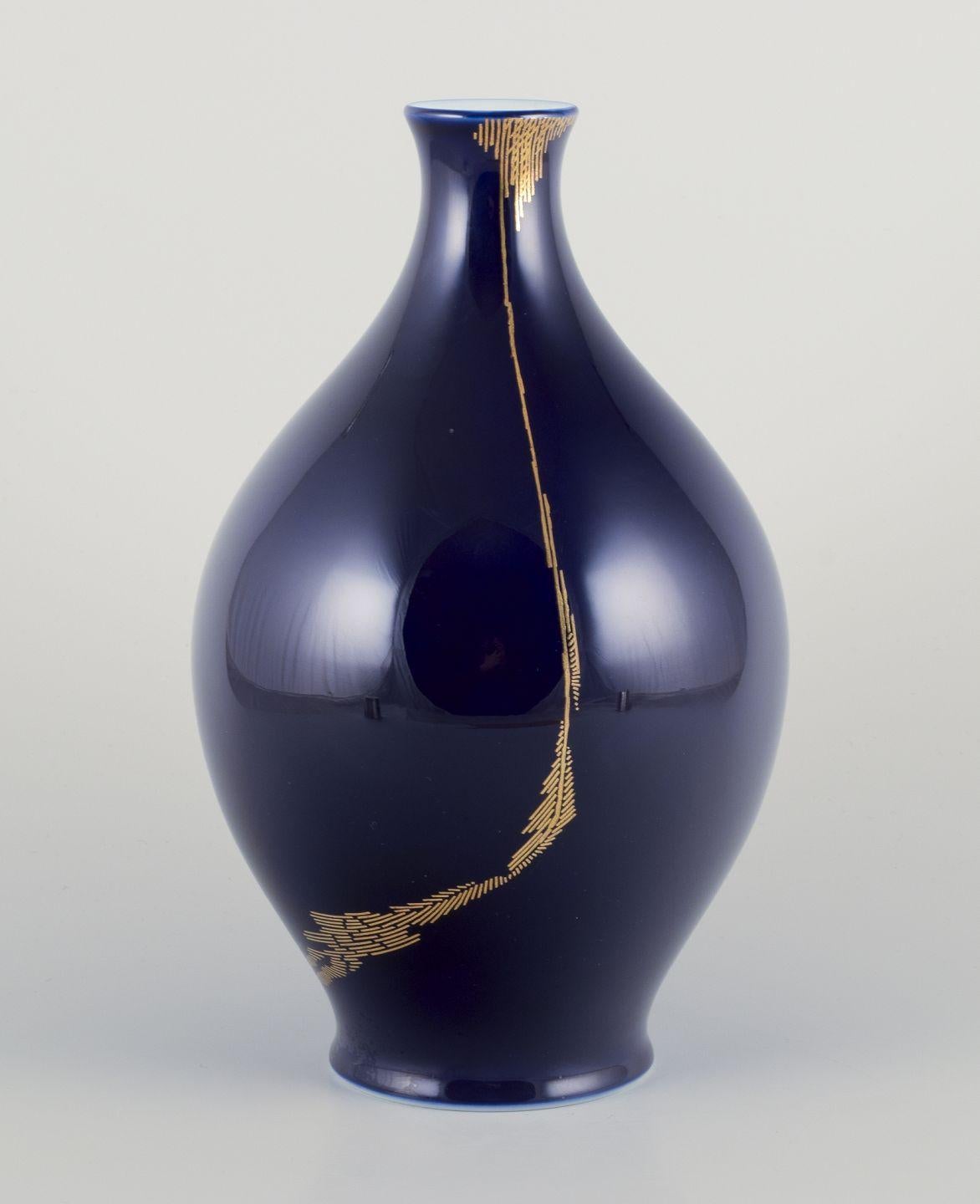 Late 20th Century James Guitet for Sèvres. Large porcelain vase with Sèvres blue glaze. For Sale