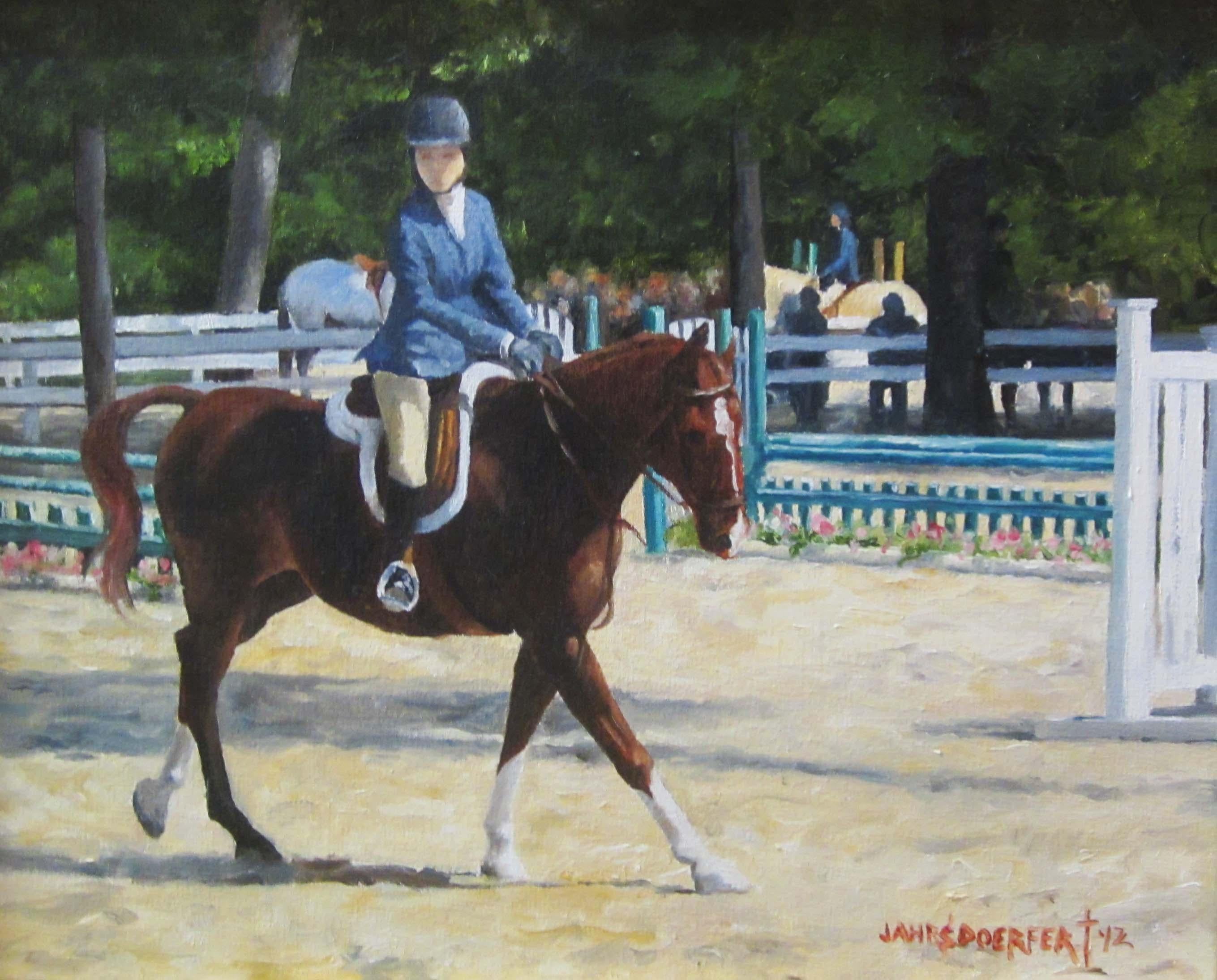 "Concentration", is an 8x10 equine landscape oil painting on canvas by artist James Jahrsdoerfer featuring a dark brown horse and rider dressed in blue dressage clothing. They are trotting around the arena, looking ahead to the next jumping element.