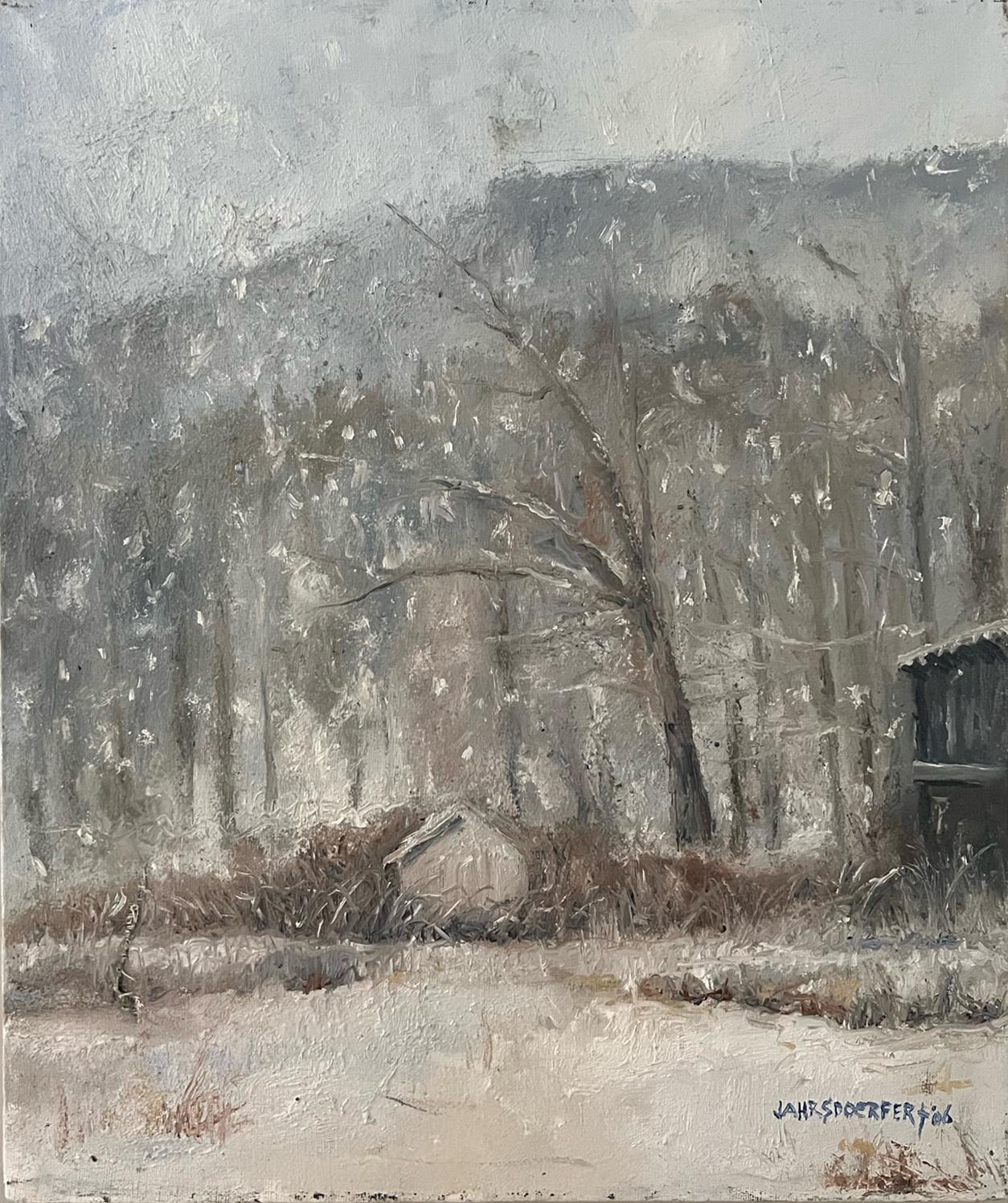 This piece, "First Snow", is a 18x15 oil painting on canvas by artist James Jahrsdoerfer featuring a snowy view into a mountain landscape. Trees catch falling snow flakes behind an old barn while looming mountains appear through the
