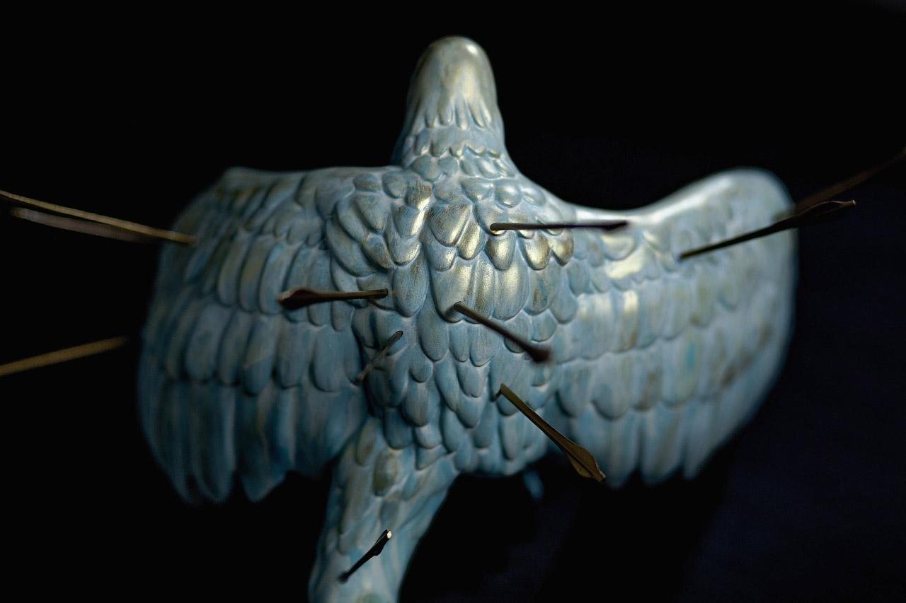 Inspired by Japanese film maestro Akira Kurosawa’s 1957 masterpiece—Throne of Blood, this beautiful pigeon sculpt with a volley of arrows pierced through his body is an allegorical reference to the film’s protagonist, General Washizu. The film