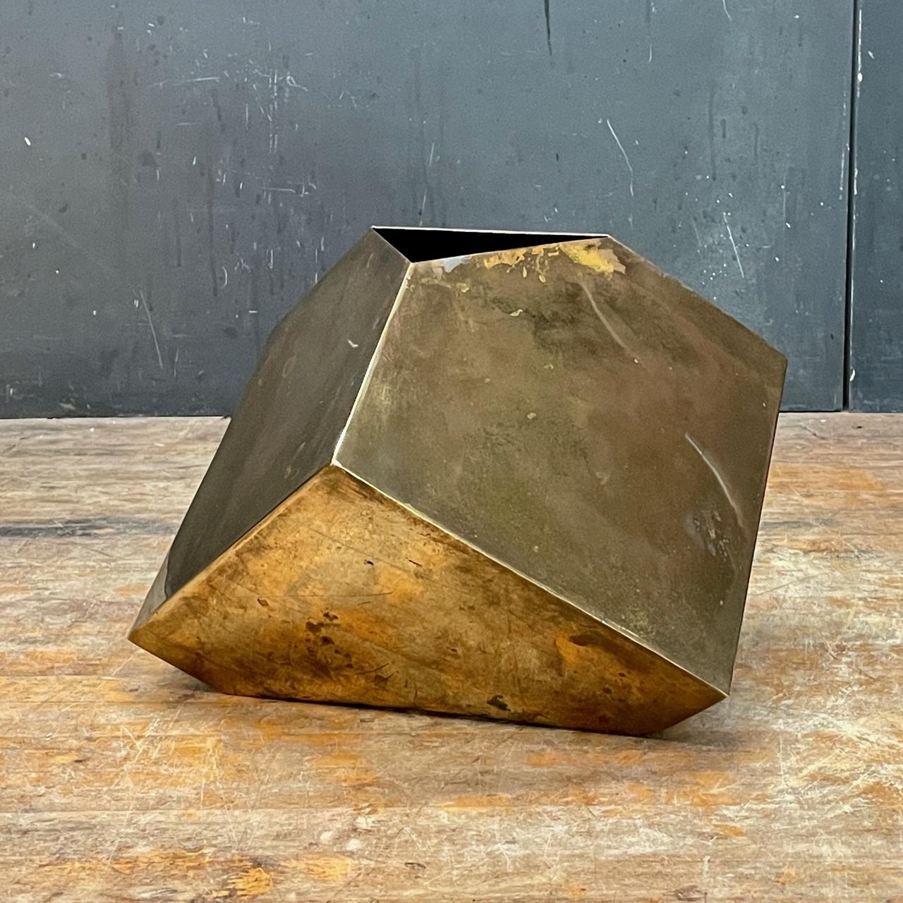 Late Mid-Century or Post Modern Era design, time-worn tarnished patinated warm brass, interesting geometric vase form. A nice rare large size. Showing some wear; a small dent to one fold, and an unfinished seam at mouth of vase. Nothing is loose,