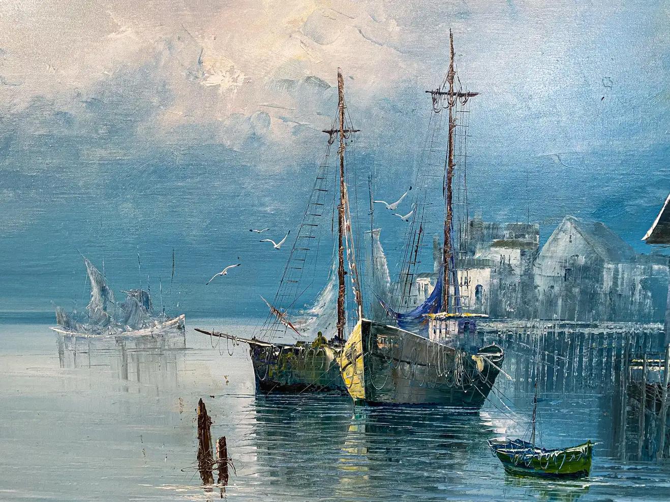 A late 20th century oil on canvas of a marine landscape depicting boats at a dock featuring a blue tone. The painting, an exemplary work of the American landscape art work of the 20th century, shows amazing details and is presented in custom gilt