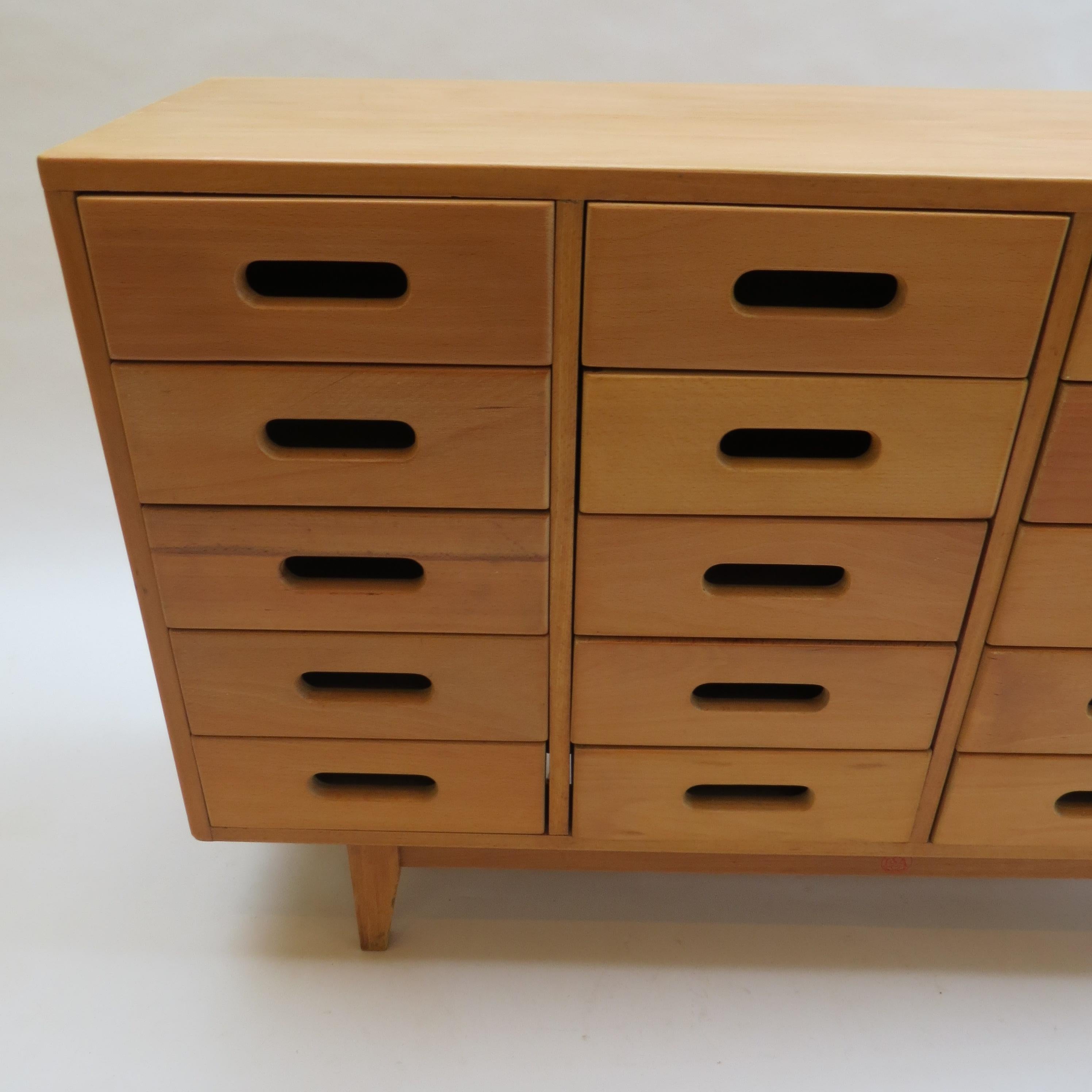 Chest of drawers dating from the 1950s, designed by James Leonard and manufactured by Esavian, UK.

Solid beech case with solid beech drawer fronts and beech drawer linings.  In very good overall condition, the case has been professionally