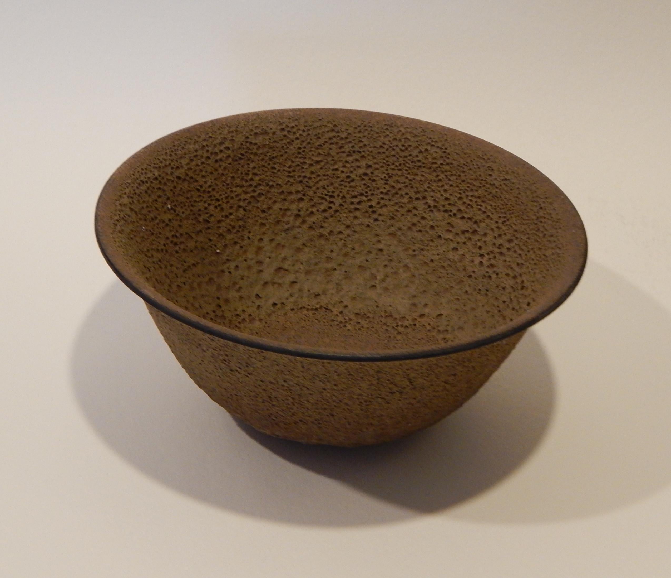Flared studio bowl with lava glaze by well-known California potter James Lovera (1920-2015).
Perfect for a centerpiece bowl in a modern home. Measures 4