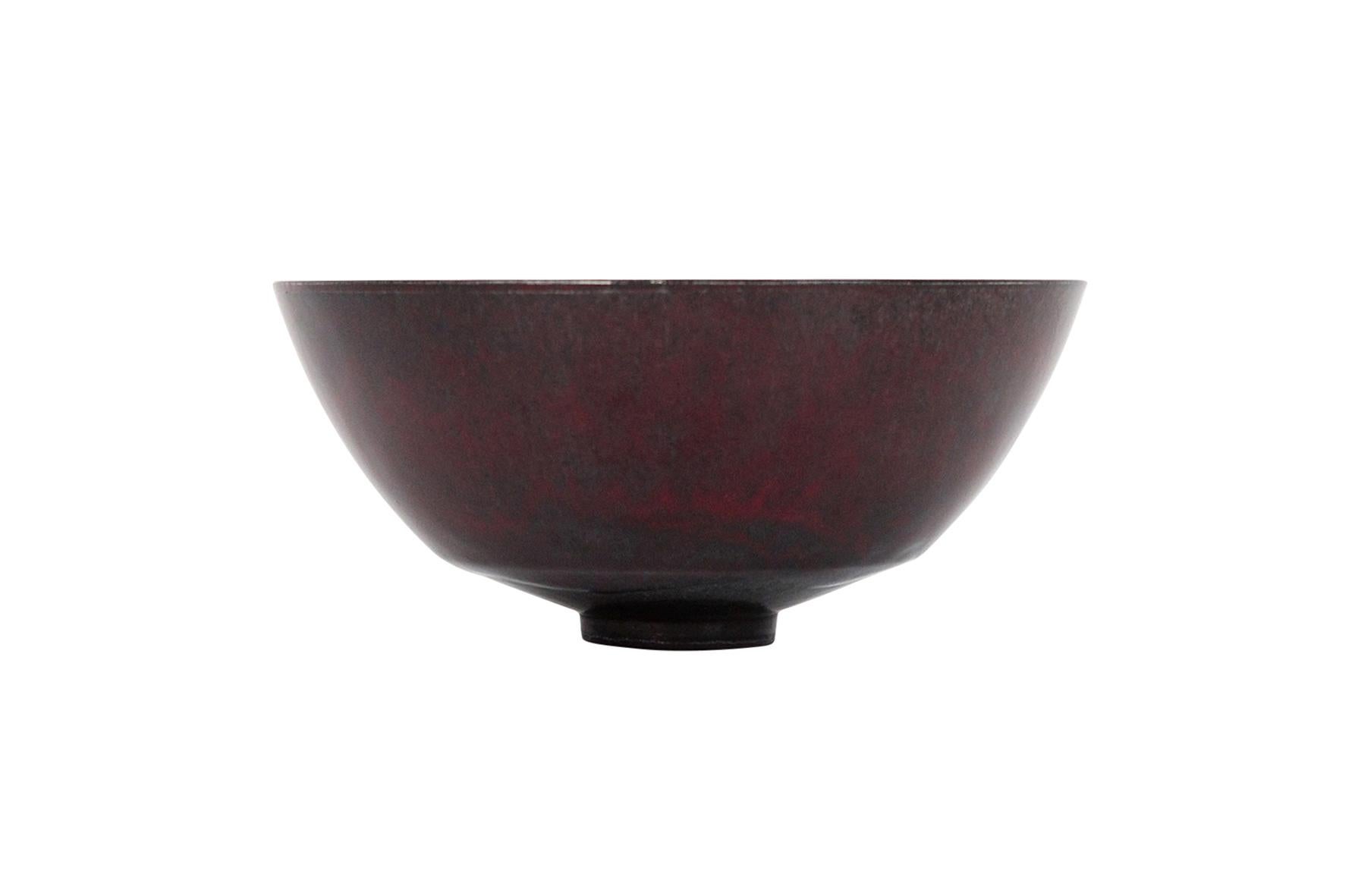 Thin walled studio potter bowl by noted Californian ceramicist James Lovera. Rich ox blood red glazing to this superb example. Signed with 