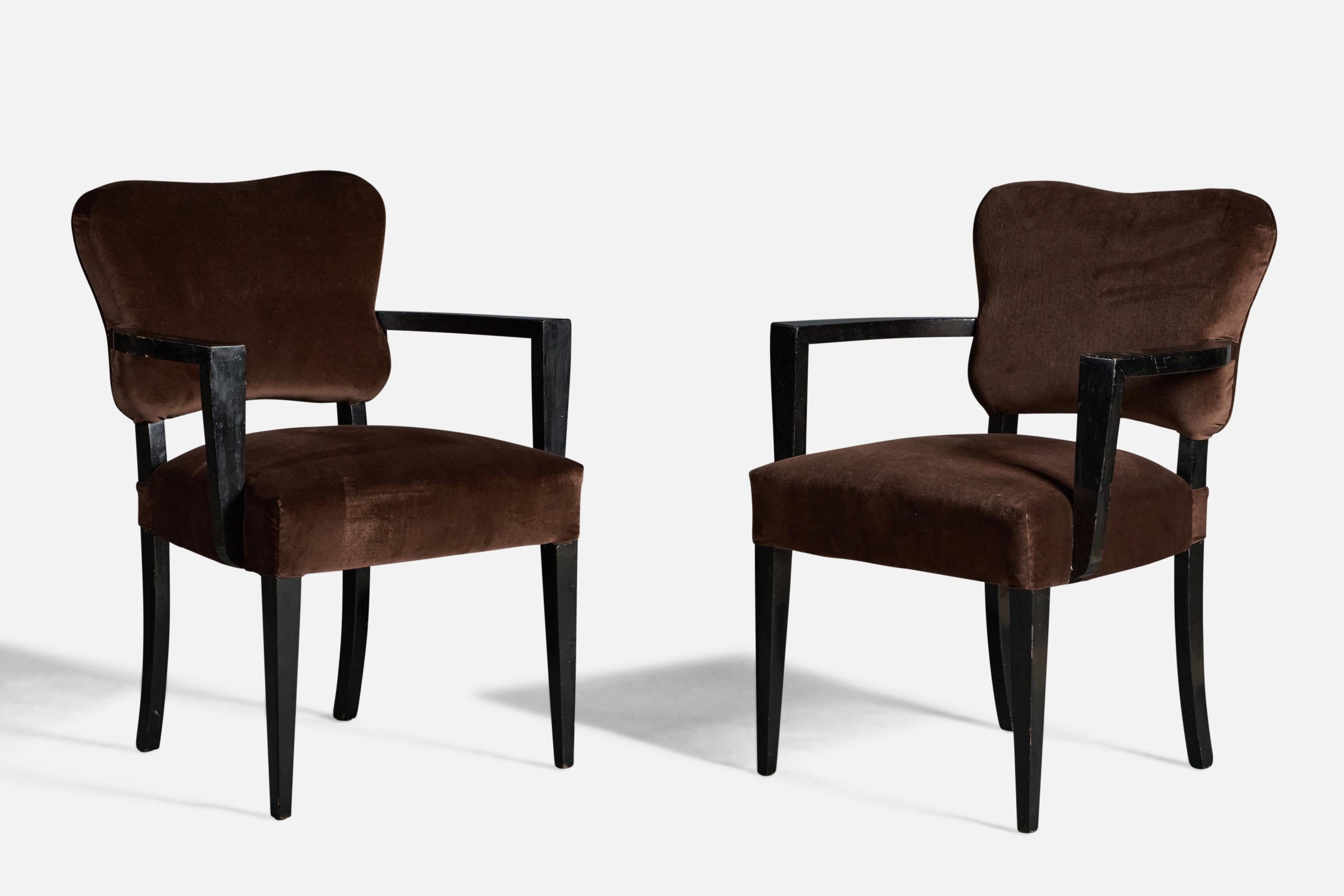 A pair of black-lacquer wood and brown velvet armchairs, designed and produced by James Mont, USA, c. 1940s.
