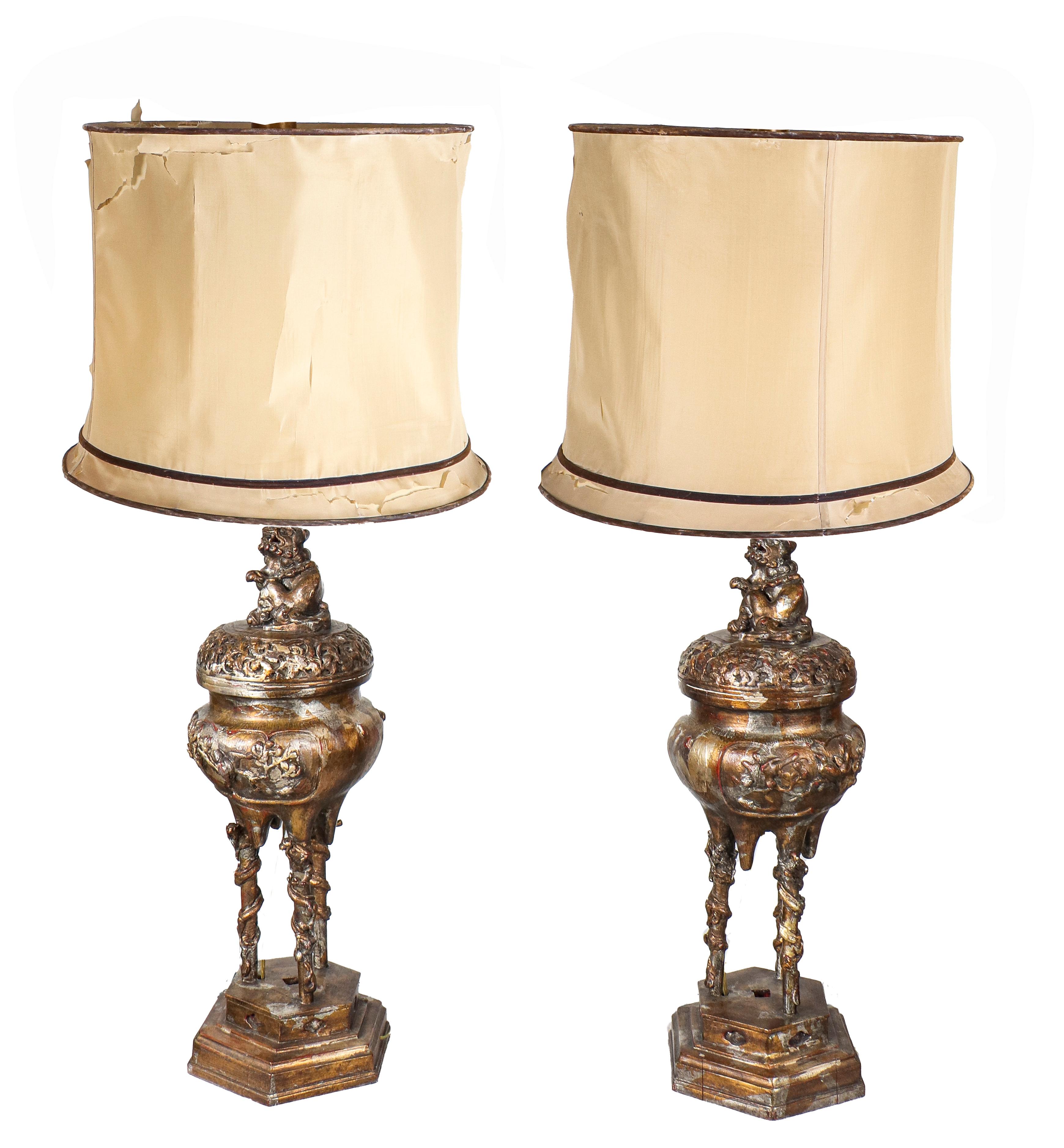 James Mont Asian Mid-Century Modern pair of molded composition table lamps, parcel gilt and parcel silvered, in Chinese Modern taste, designed circa 1960, with original silk peplum shades. Measures: 33