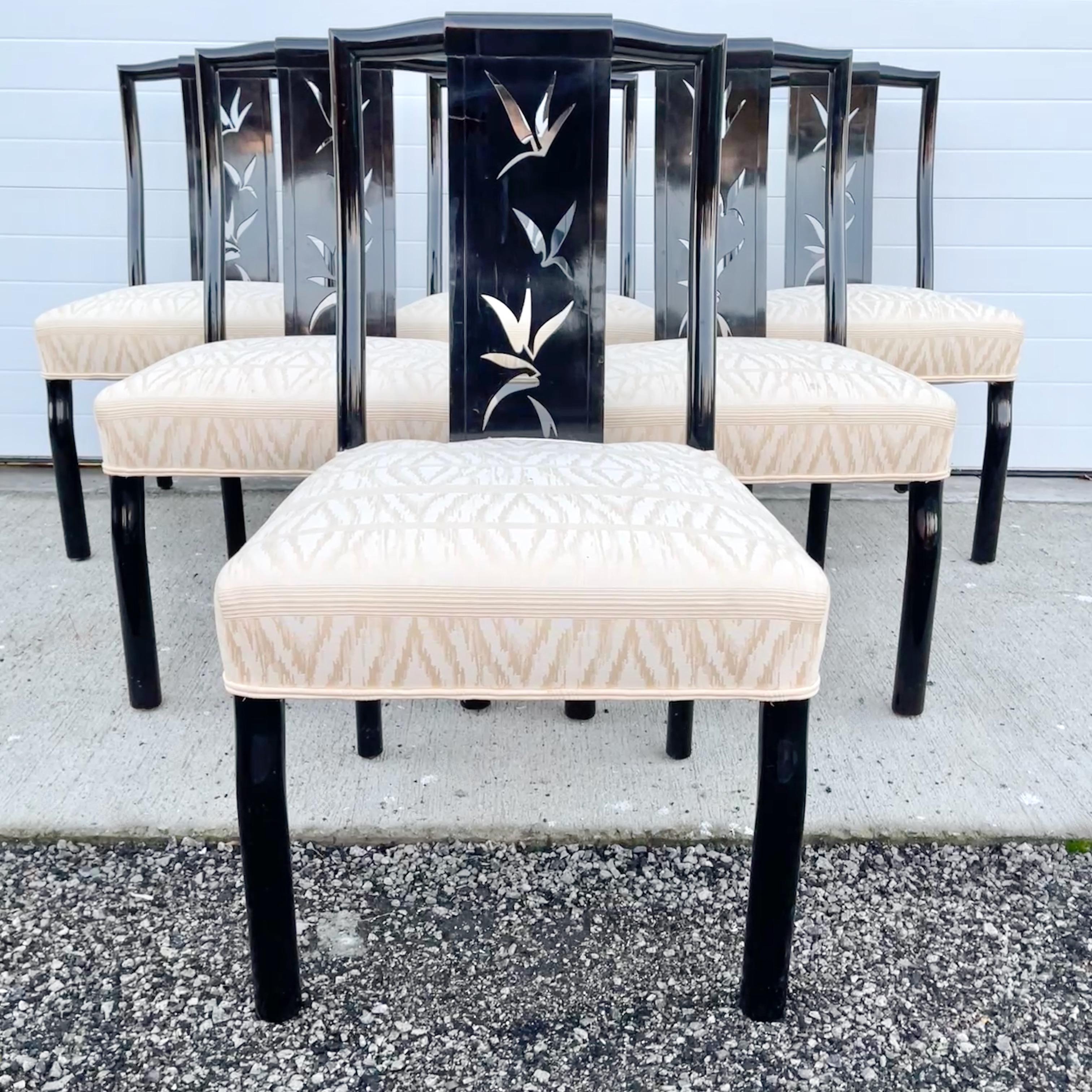 Set of six James Mont designed chinoiserie decorated and black lacquered dining side chairs with pierced bamboo decoration to backrest and upholstered seats. Accompanied by an original receipt from James Mont dated 1957 delivered to a home in