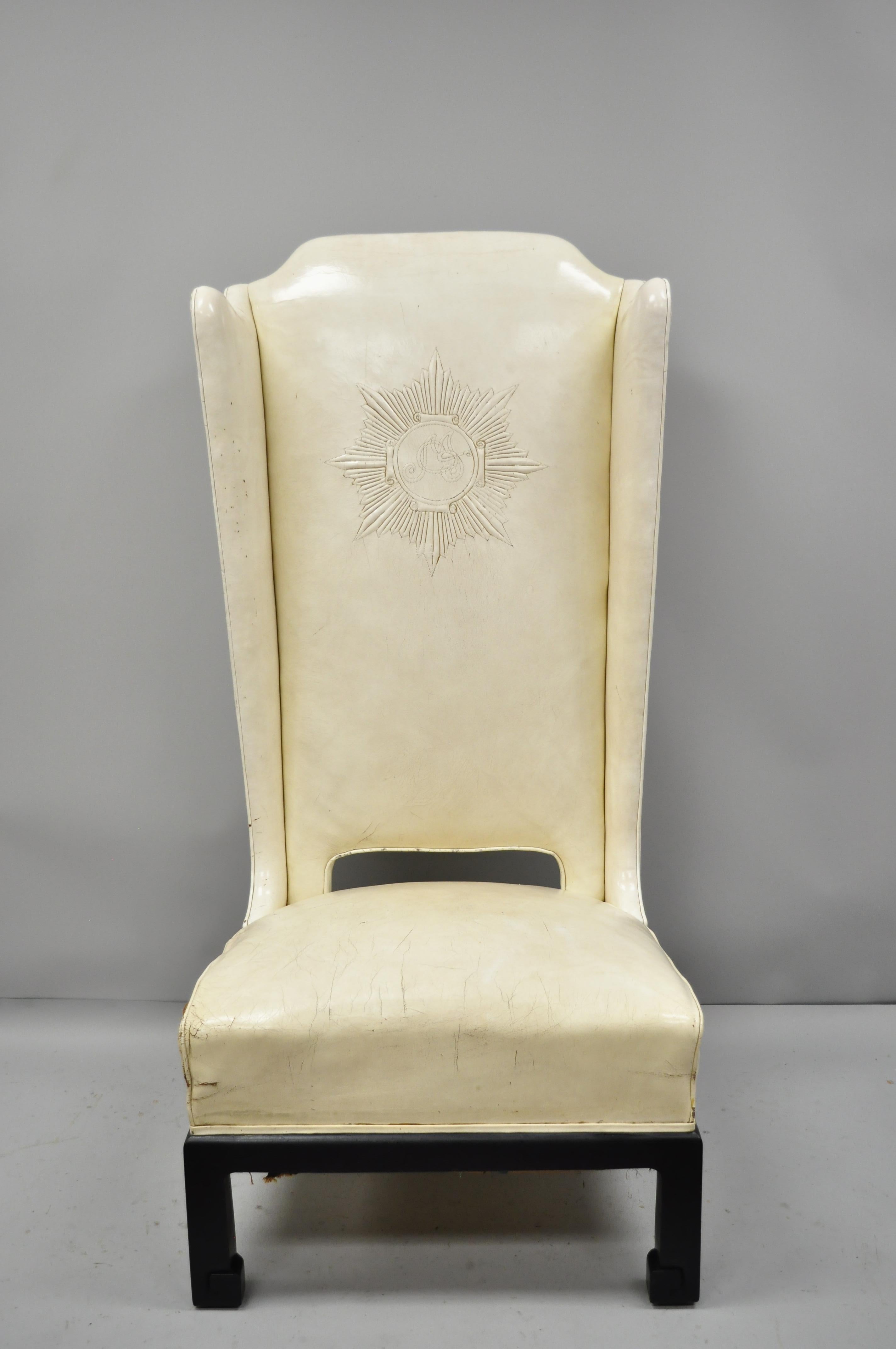 James Mont oversize leather oriental high back chair. Item features white leather upholstery, tall oversized form, carved Ming style legs, sleek sculptural form. Mid-20th century. Measurements: 57.5