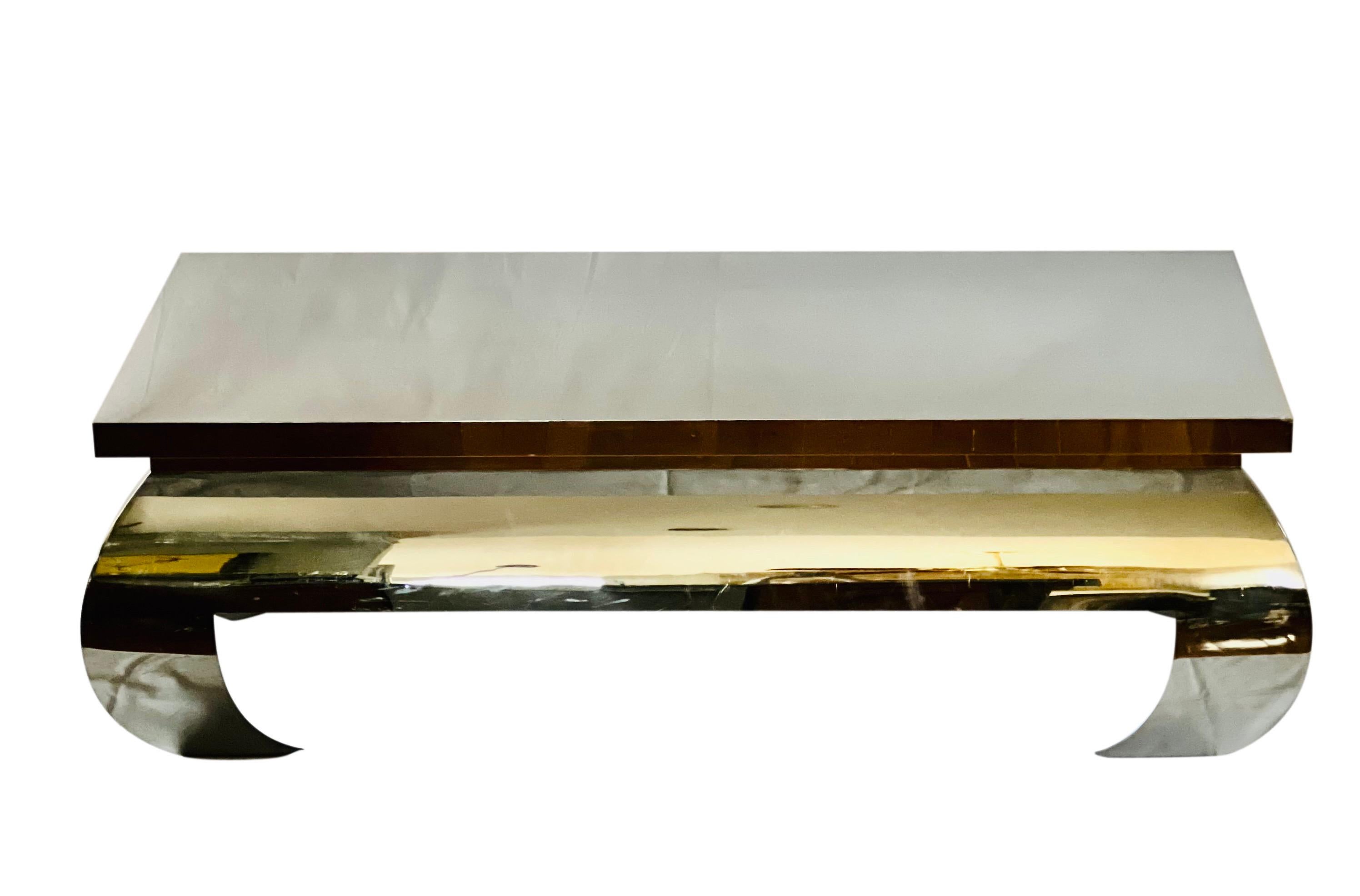 Gorgeous James Mont polished stainless steel coffee table.

This amazing table has a luminous presence with brilliant reflection from every angle accentuating its dramatic design. A stunning focal point for any room.