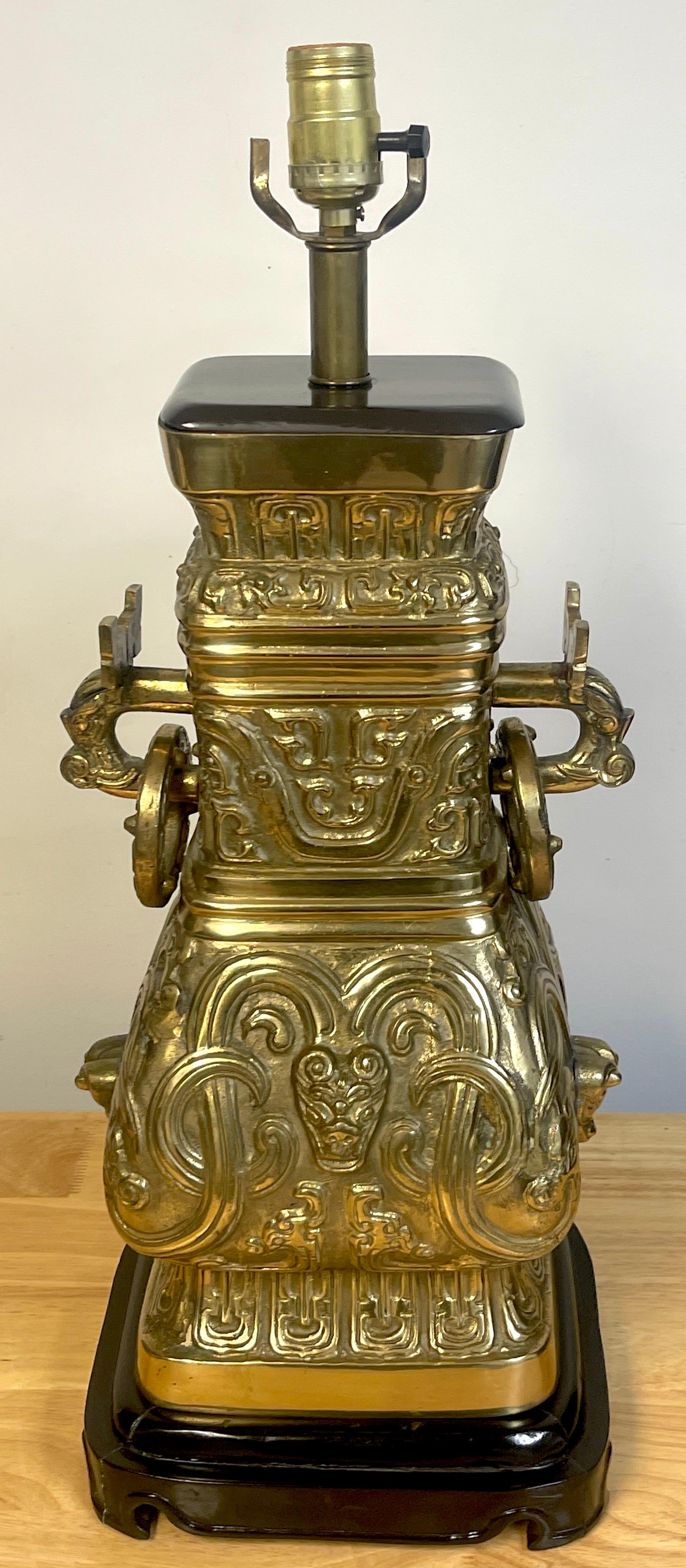 James Mont style brass Chinese wine vessel (Hu) vase, Now as a Lamp, of good size and weight, beautiful casting, with custom wood mounts. Measures: 19