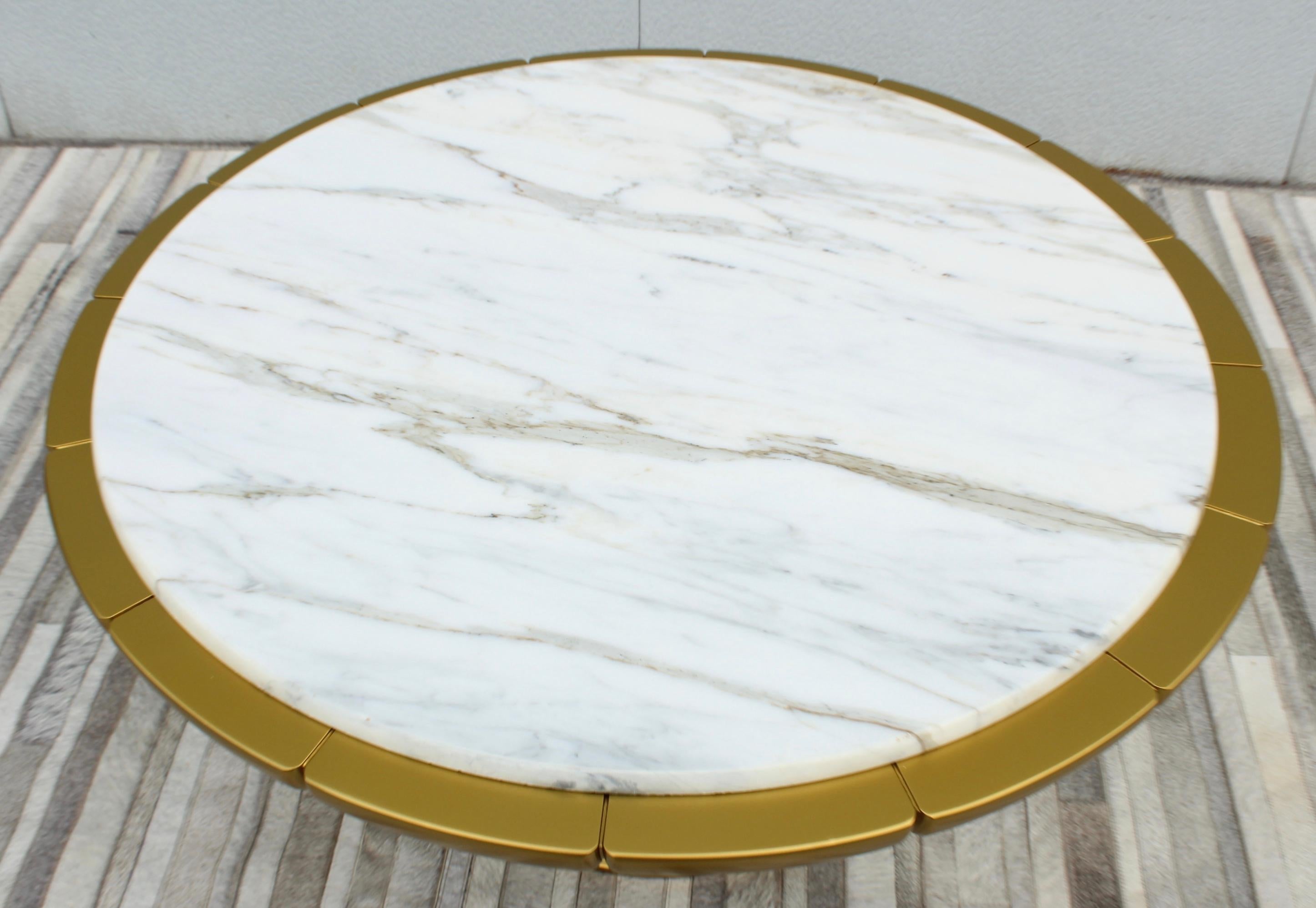 Stunning 1950's wood lacquered base with Carrara Italian marble top coffee table in the style of James Mont made by Weiman, the base have been lacquered in antique gold finish, there is a few chips to the edge of the marble.