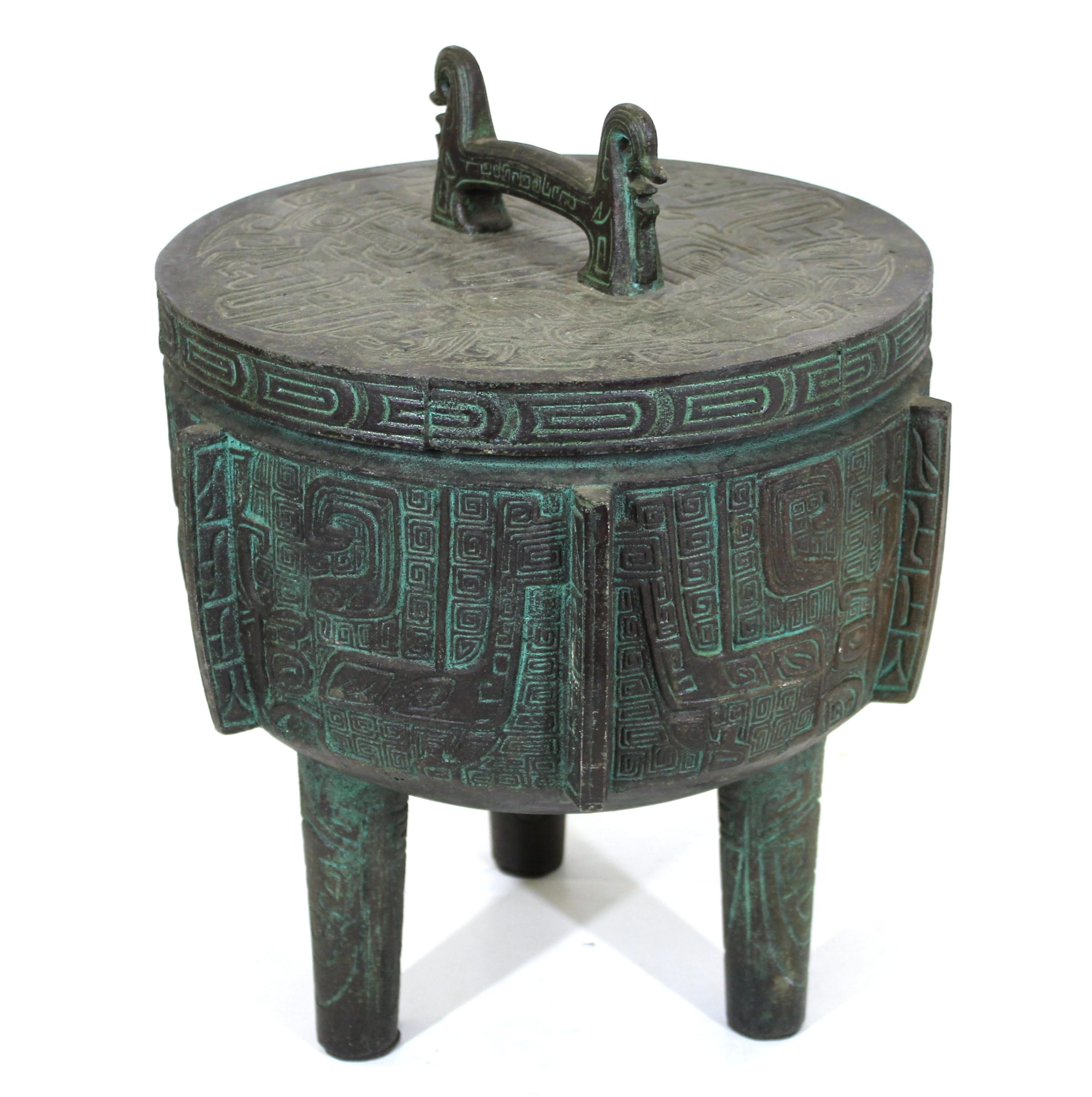 James Mont style Mid-Century Modern Asian Style ice bucket with bronze patina finish. Measures: 16