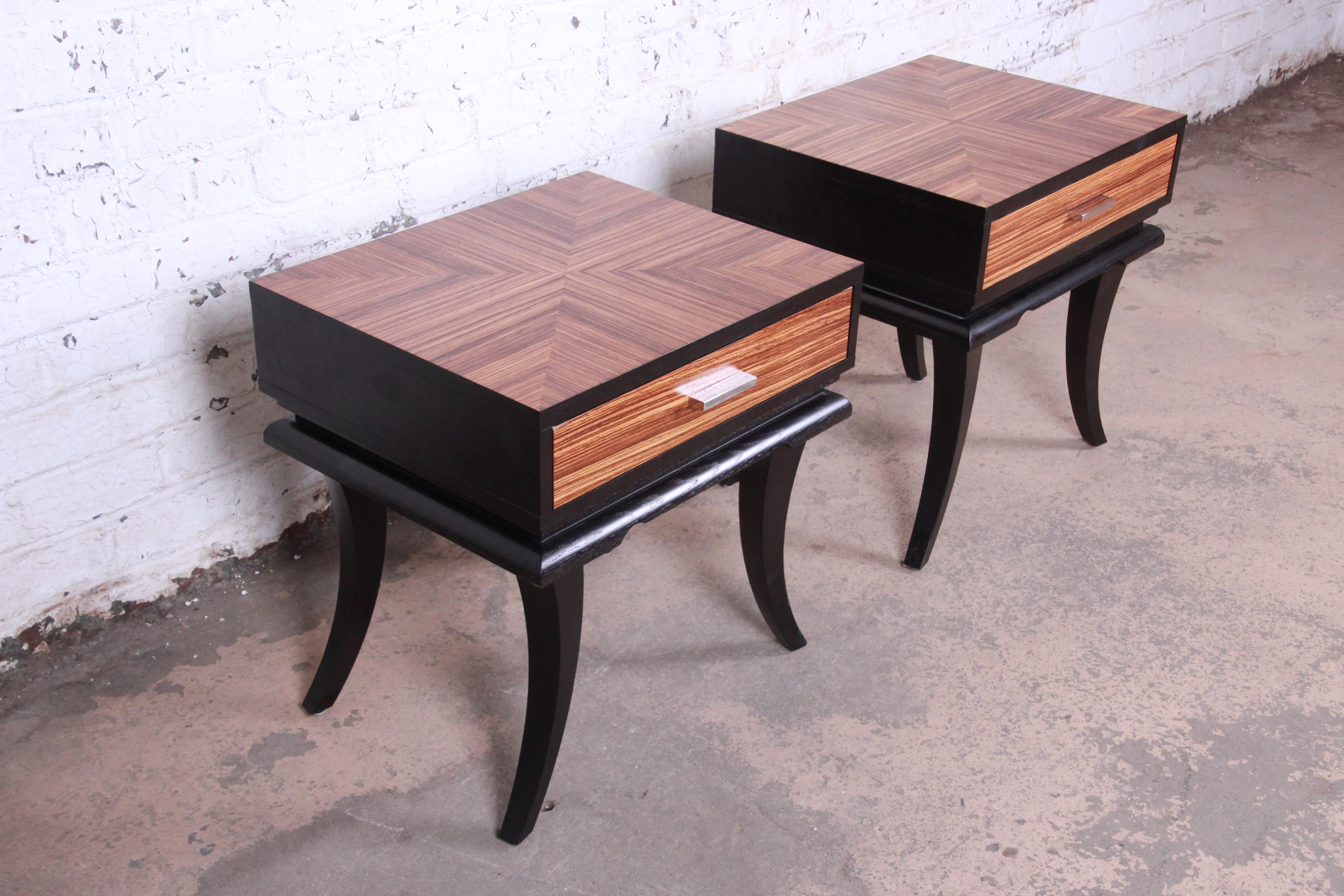 Pair of James Mont Style Zebrawood and Ebonized Saber Leg Nightstands In Good Condition In South Bend, IN