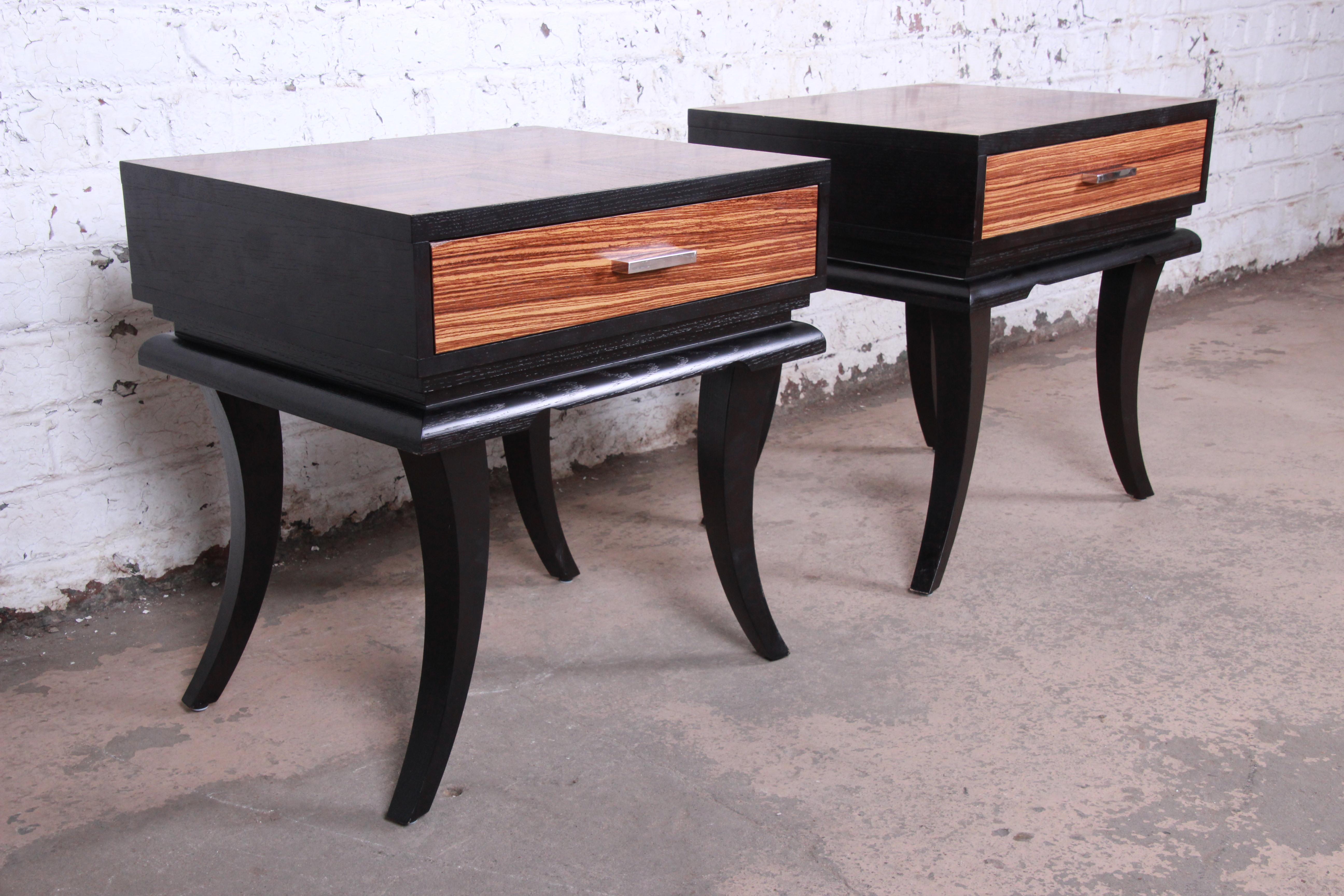 20th Century Pair of James Mont Style Zebrawood and Ebonized Saber Leg Nightstands