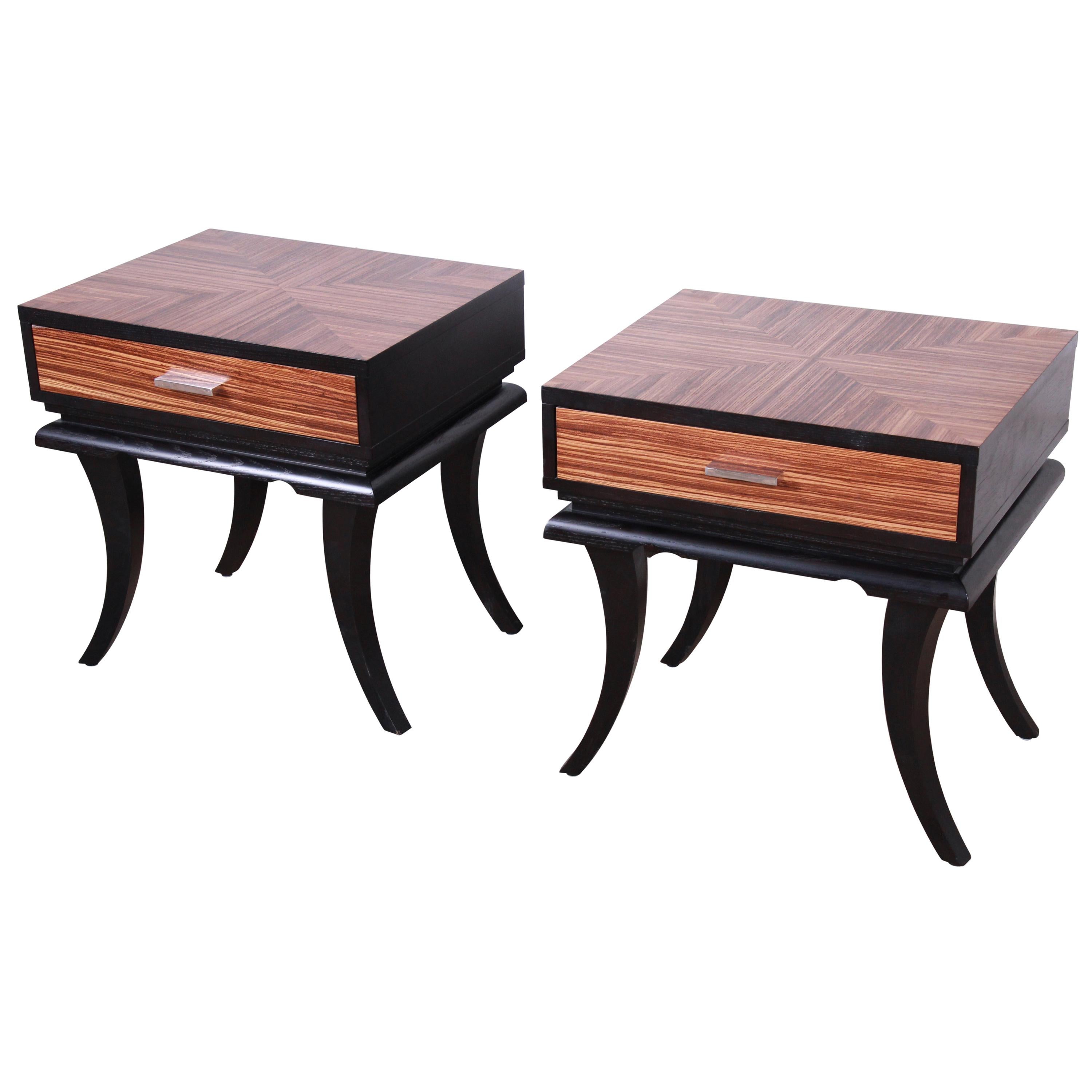 Pair of James Mont Style Zebrawood and Ebonized Saber Leg Nightstands