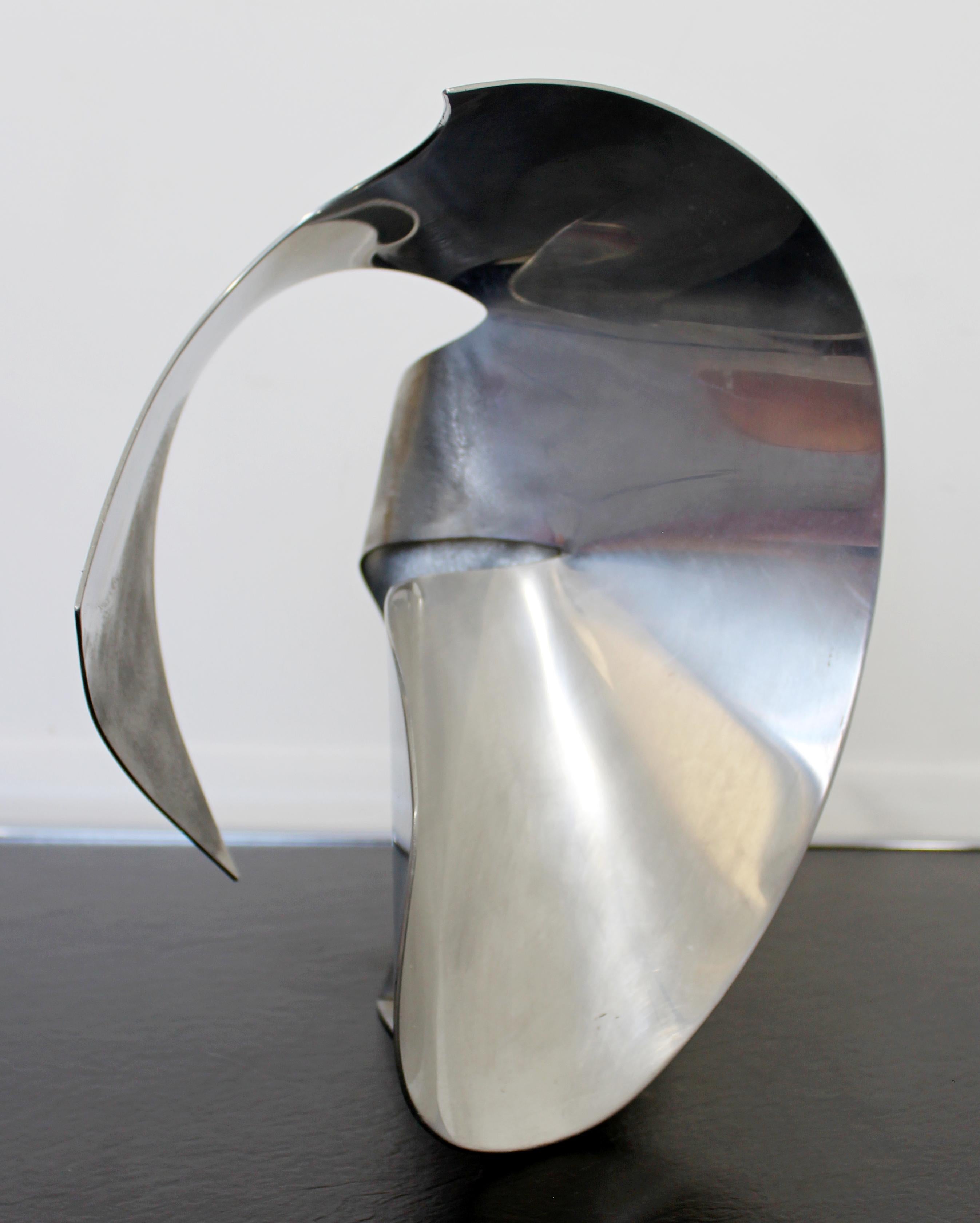 For your consideration is a captivating abstract circular aluminum sculpture titled 