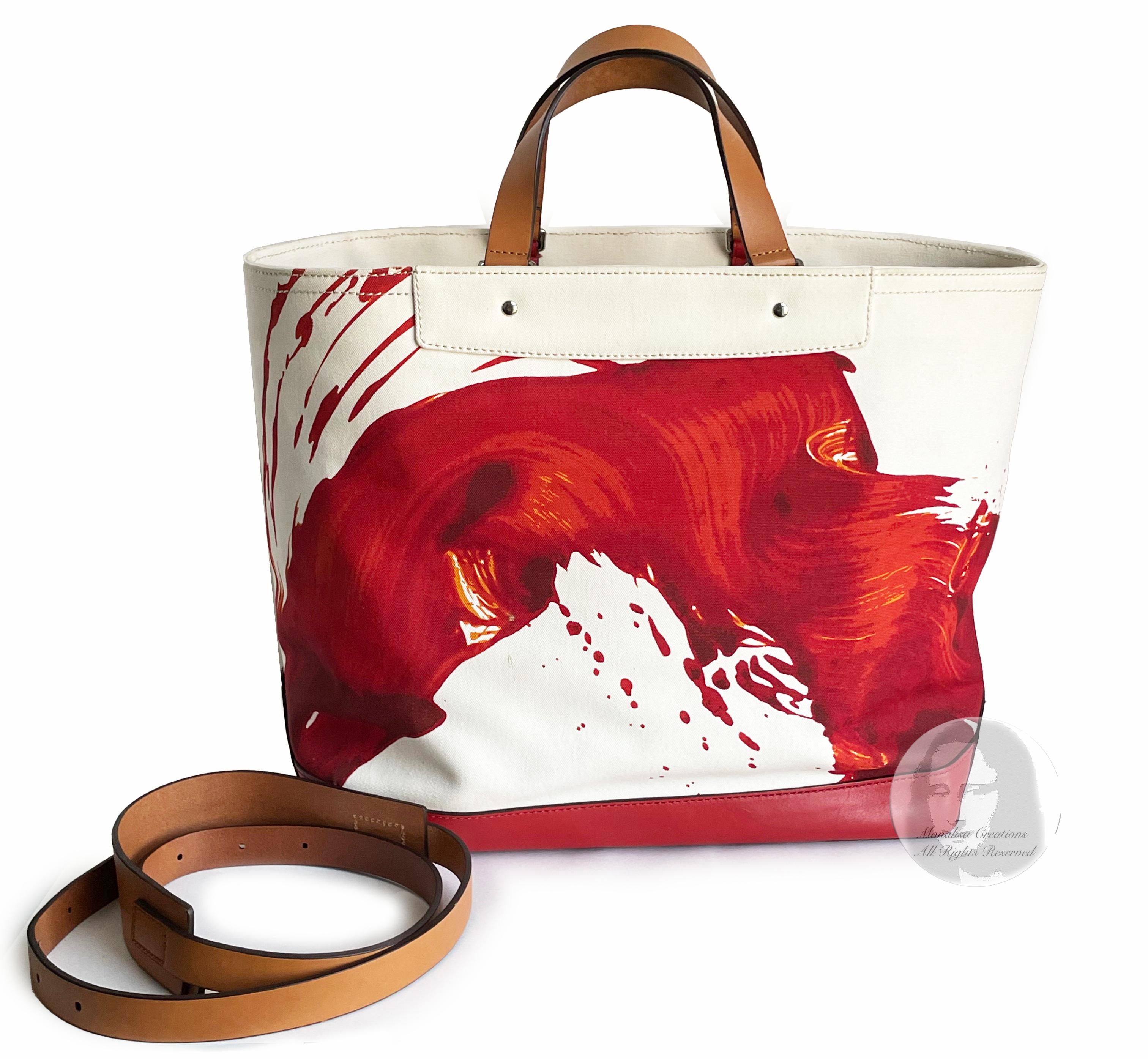 Authentic, preowned James Nares x Coach Leatherware extra large canvas and leather tote bag. This was a 2012 collaboration between artist James Nares & Coach Leatherware, with a limited edition of 175 bags.   Made from canvas and trimmed in cherry