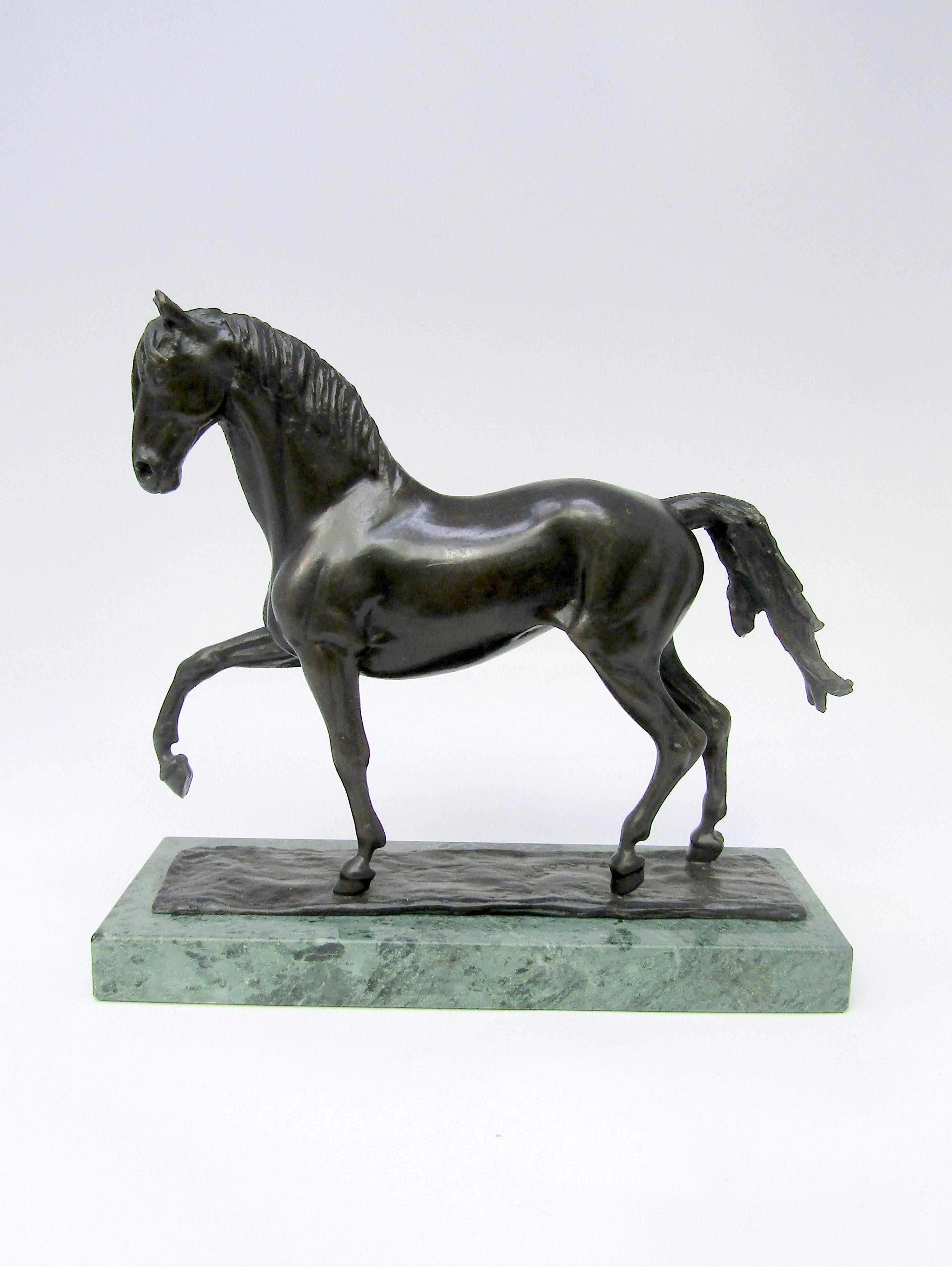 A dark patinated bronze sculpture of 'Bucephalus' on a
green marble base by James Osborne (1940-1992)
Signed and numbered 277/2000
British, circa 1985

Measures: Height 7 ¾ in / 18.5 cm
Width 8 ½ in / 21 cm.

The famous black stallion