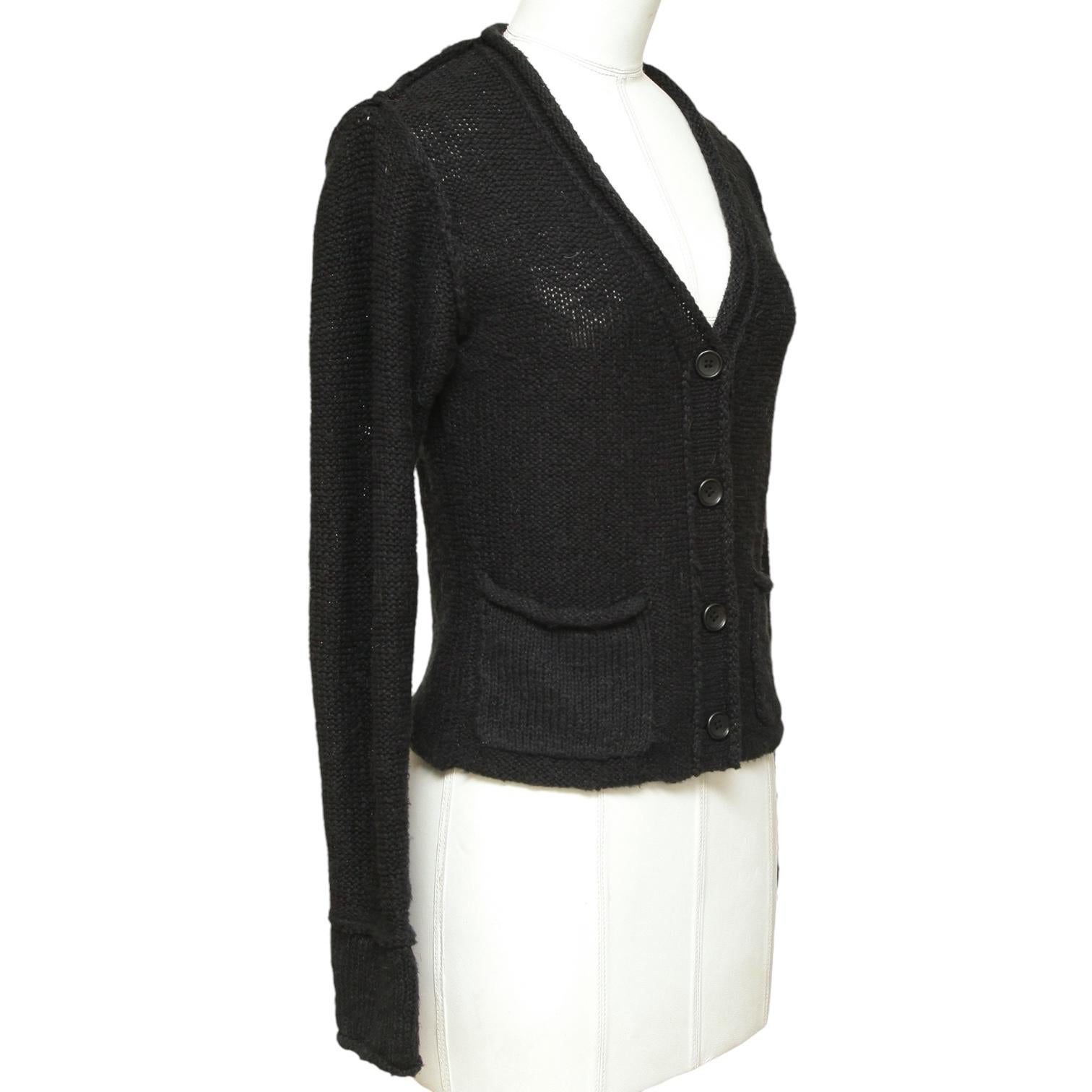 GUARANTEED AUTHENTIC JAMES PERSE LONG SLEEVE BLACK CARDIGAN

Design:
  - V neck.
  - Long sleeves.
  - Rolled trim.
  - Front dual pockets.
  - Front button closure.

Size: 0

Material: 61% Cotton, 39% Linen

Measurements (Approximate laid flat,